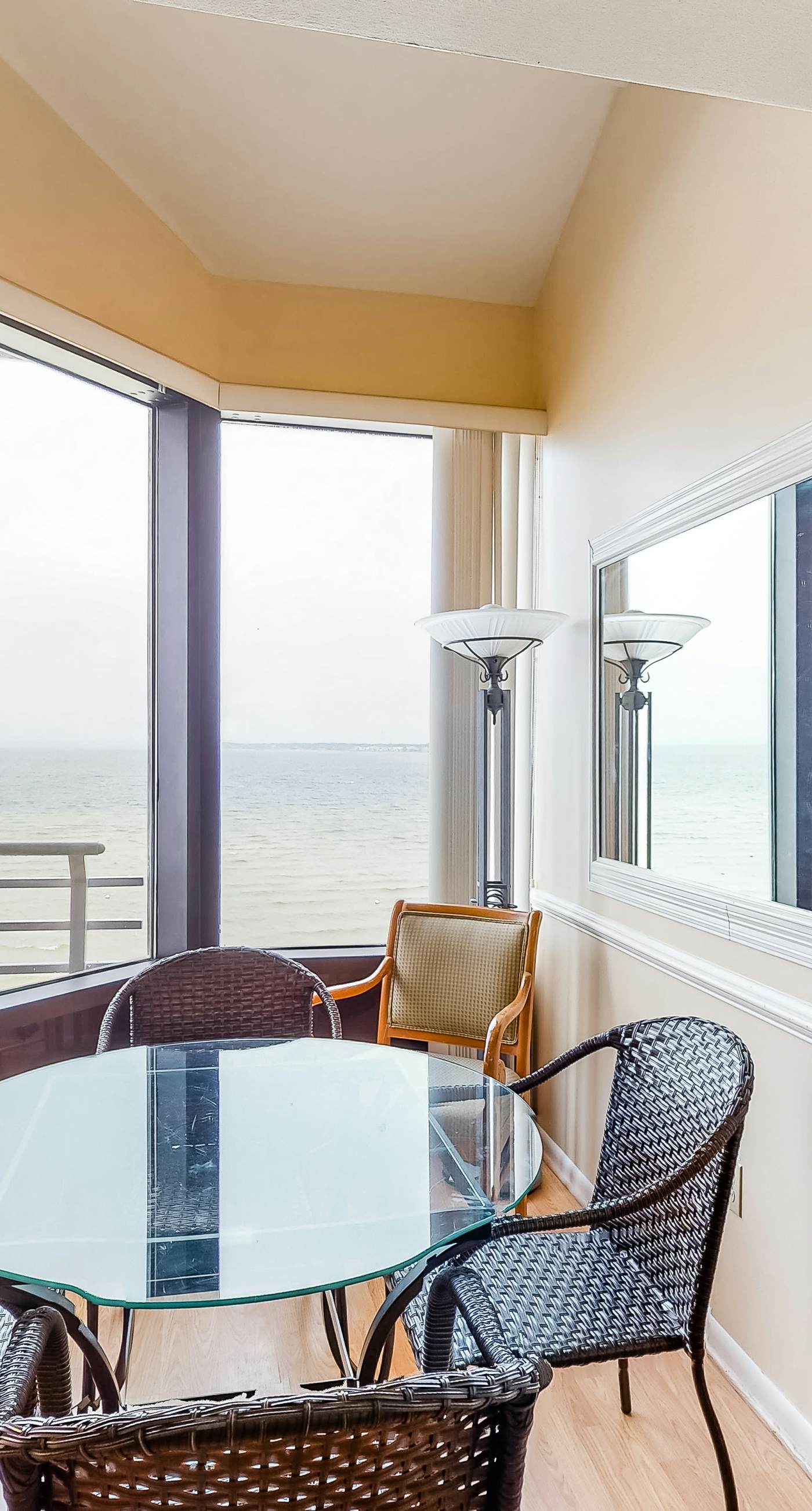 Inviting condo with bay & ocean views, & pool - steps to the beach
