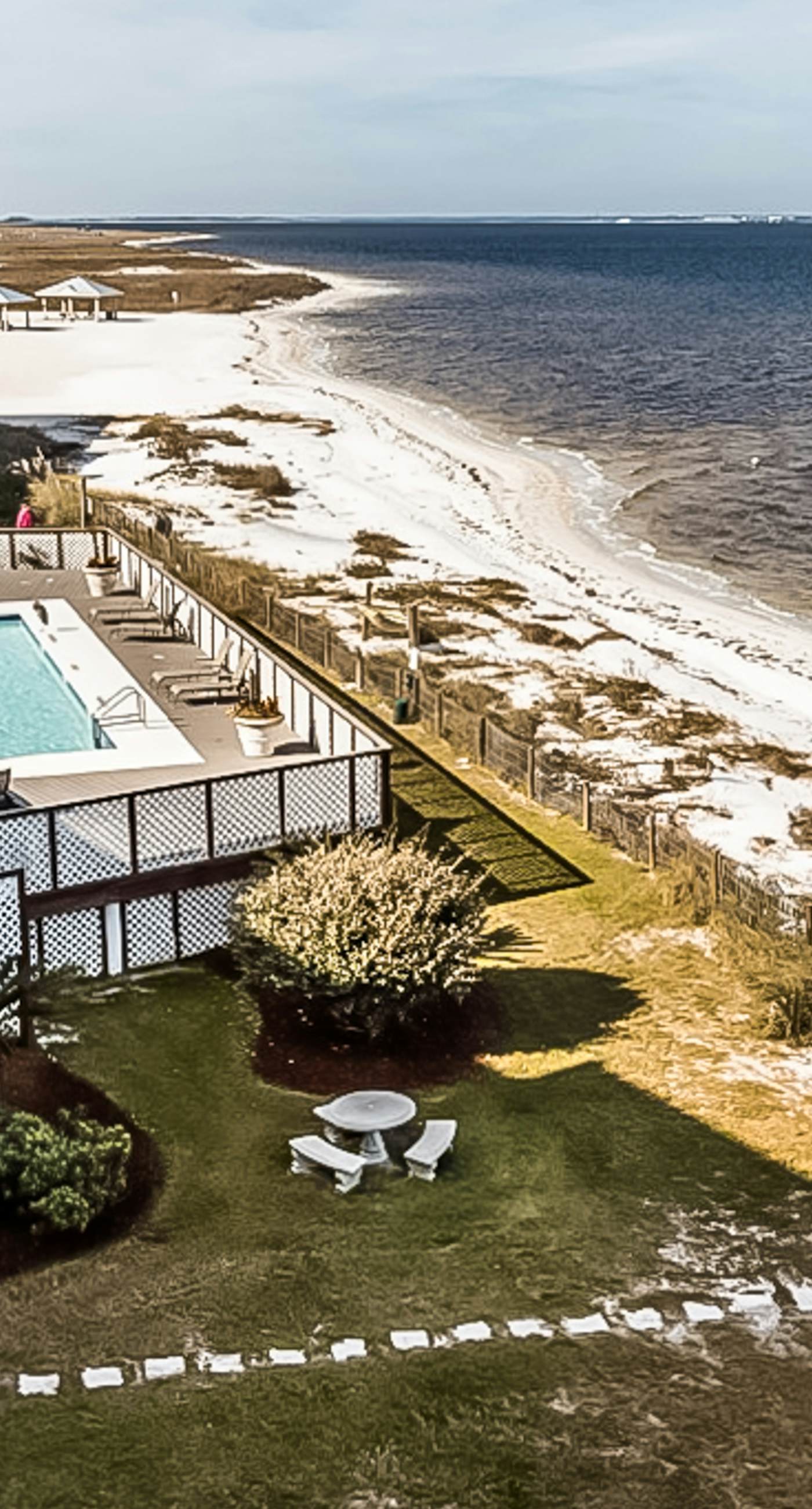 Inviting condo with bay & ocean views, & pool - steps to the beach