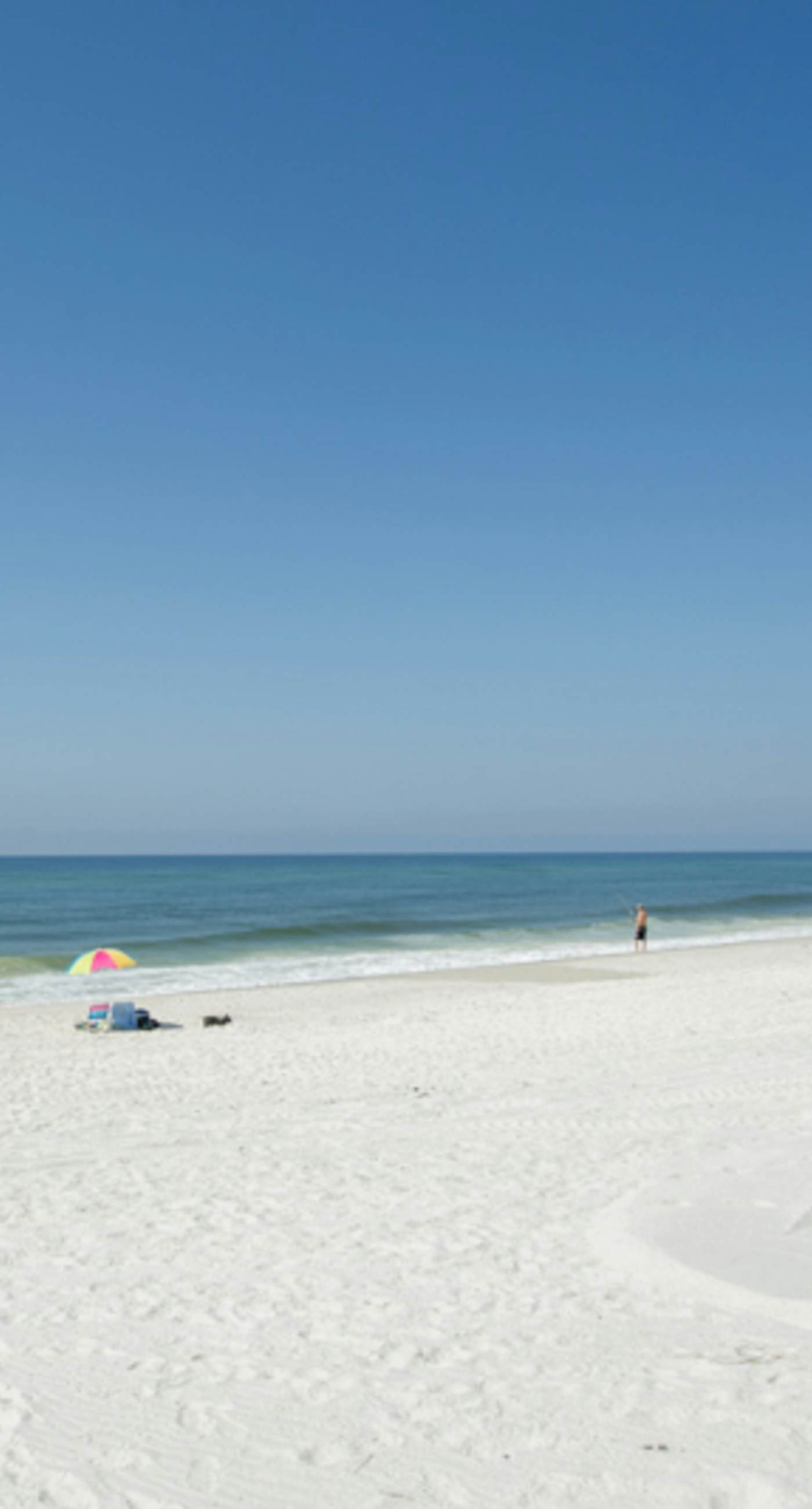 Inviting condo with bay & ocean views, & pool - steps to the beach