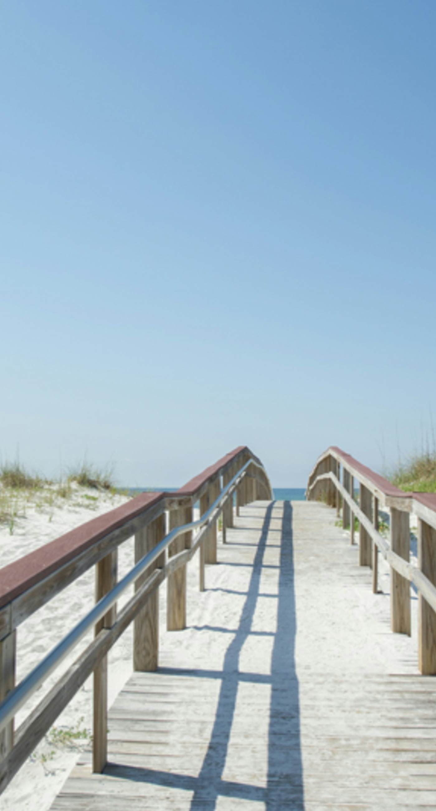 Inviting condo with bay & ocean views, & pool - steps to the beach