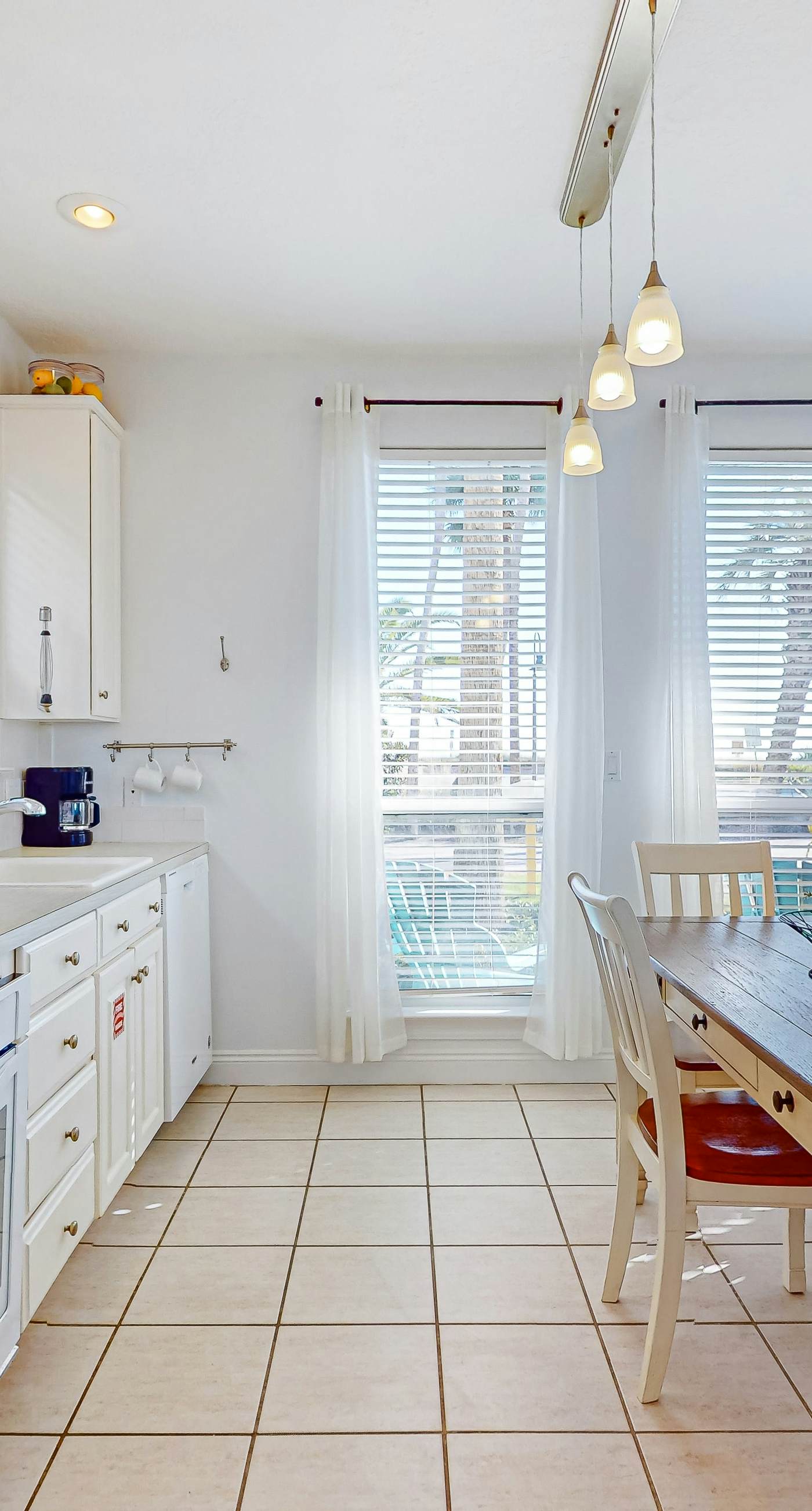 Beautiful lakefront condo with WiFi, beach views, & pool