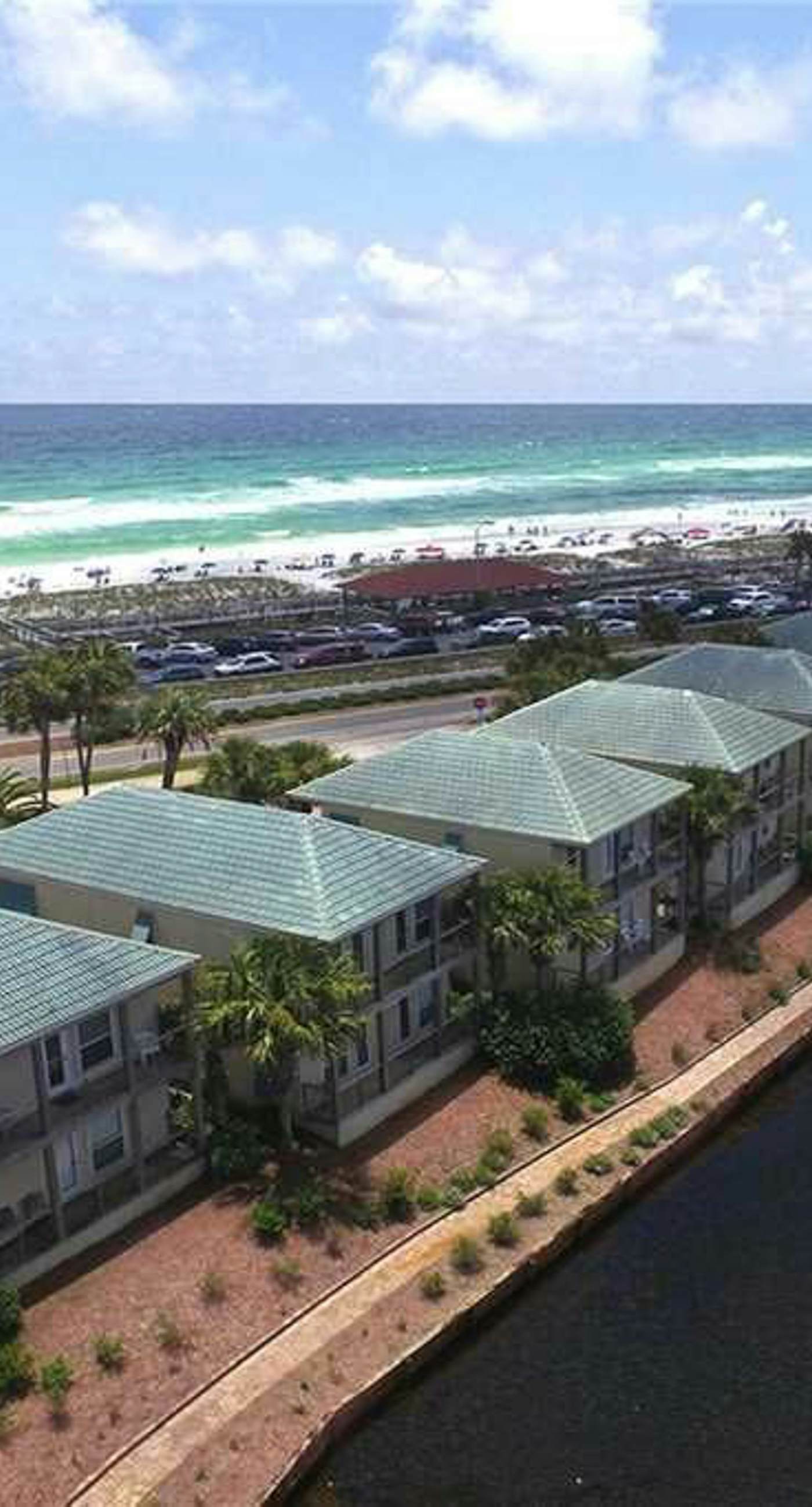 Beautiful lakefront condo with WiFi, beach views, & pool