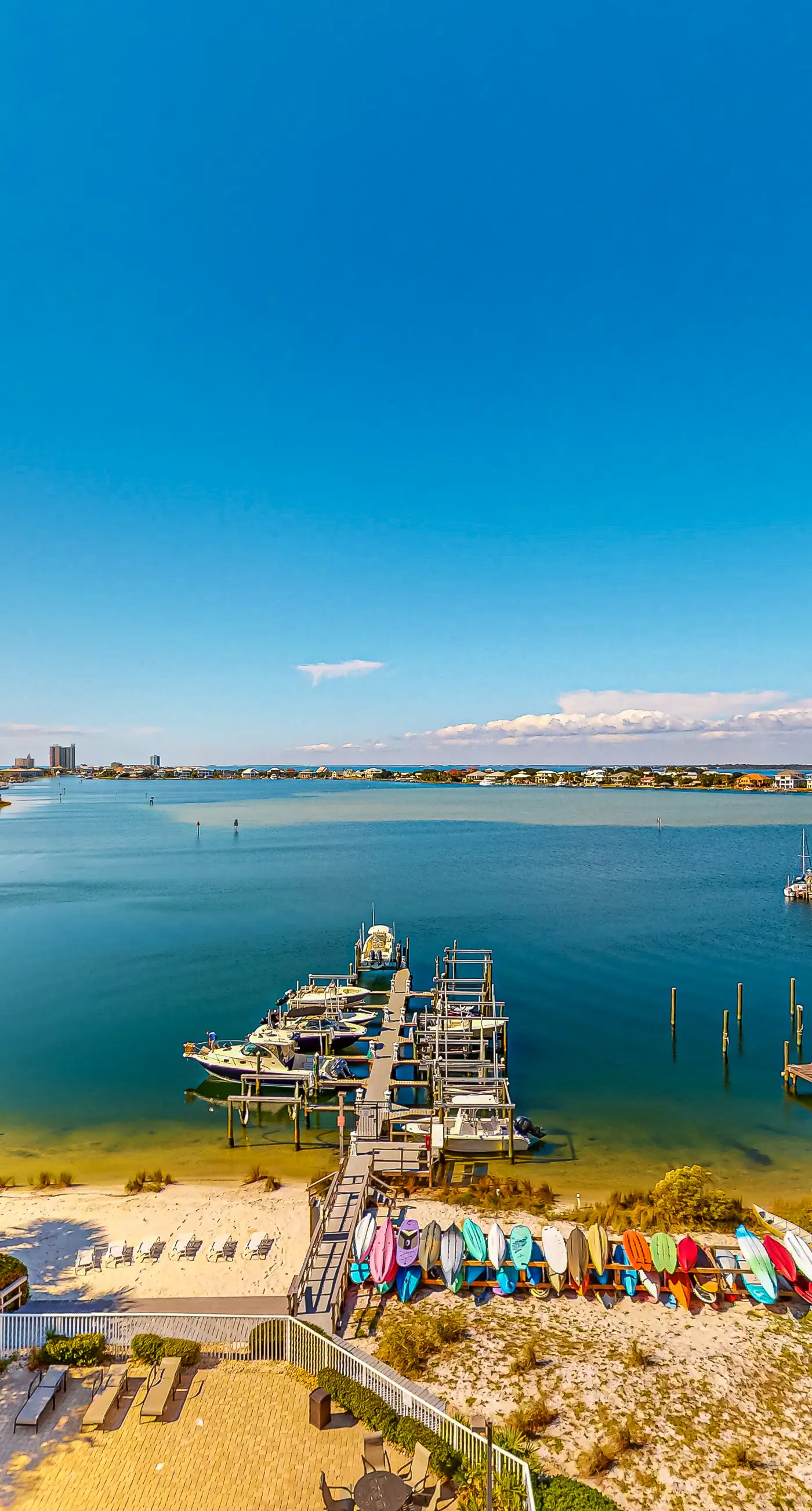 Sunlit & tropical beachfront condo with pool, gym, balcony views