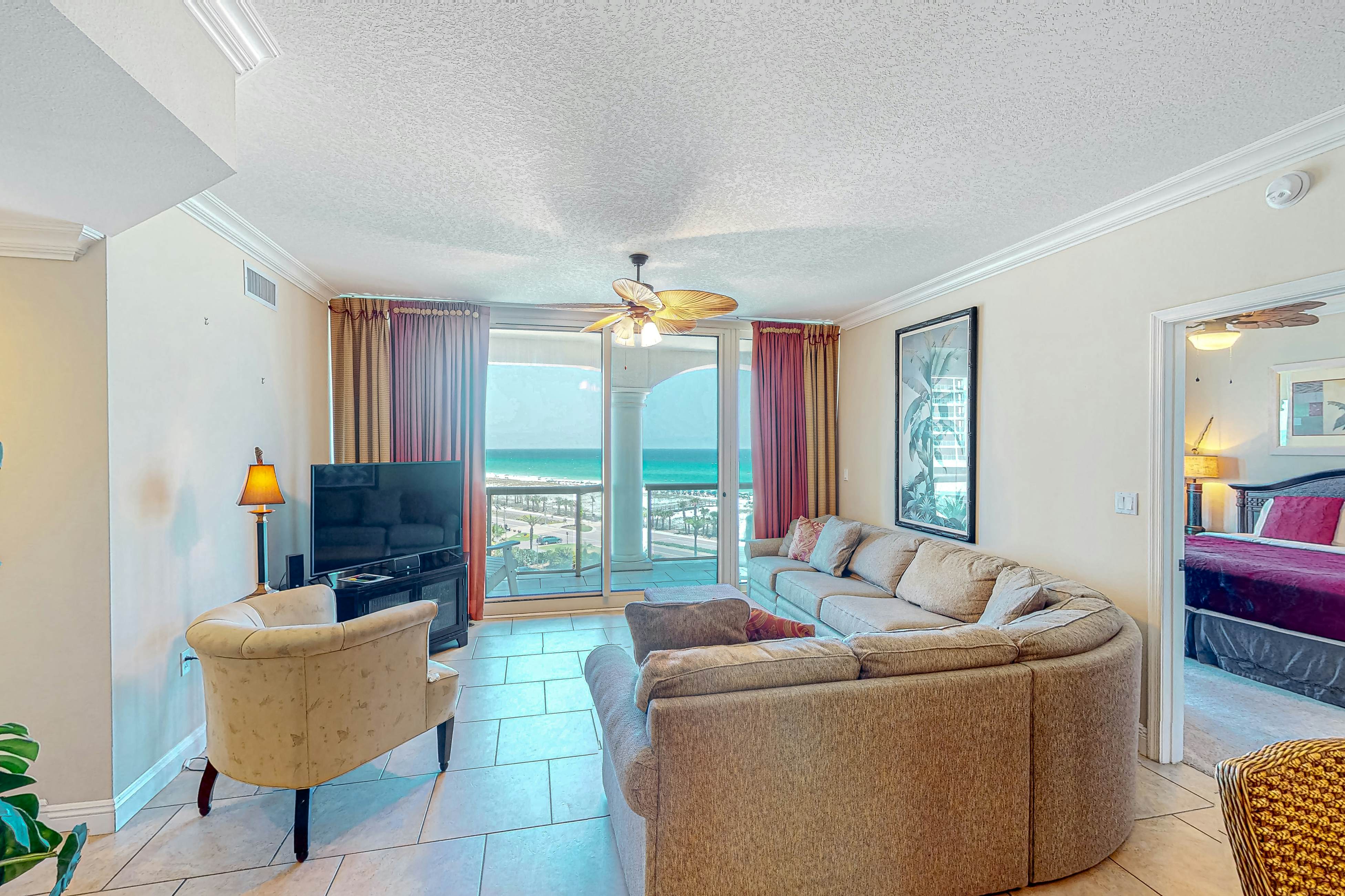 Gulf-view condo with pool, hot tub, beach access, tennis, balcony, AC, & W/D