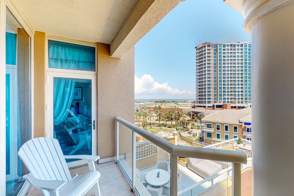 Gulf-view condo with pool, hot tub, beach access, tennis, balcony, AC, & W/D