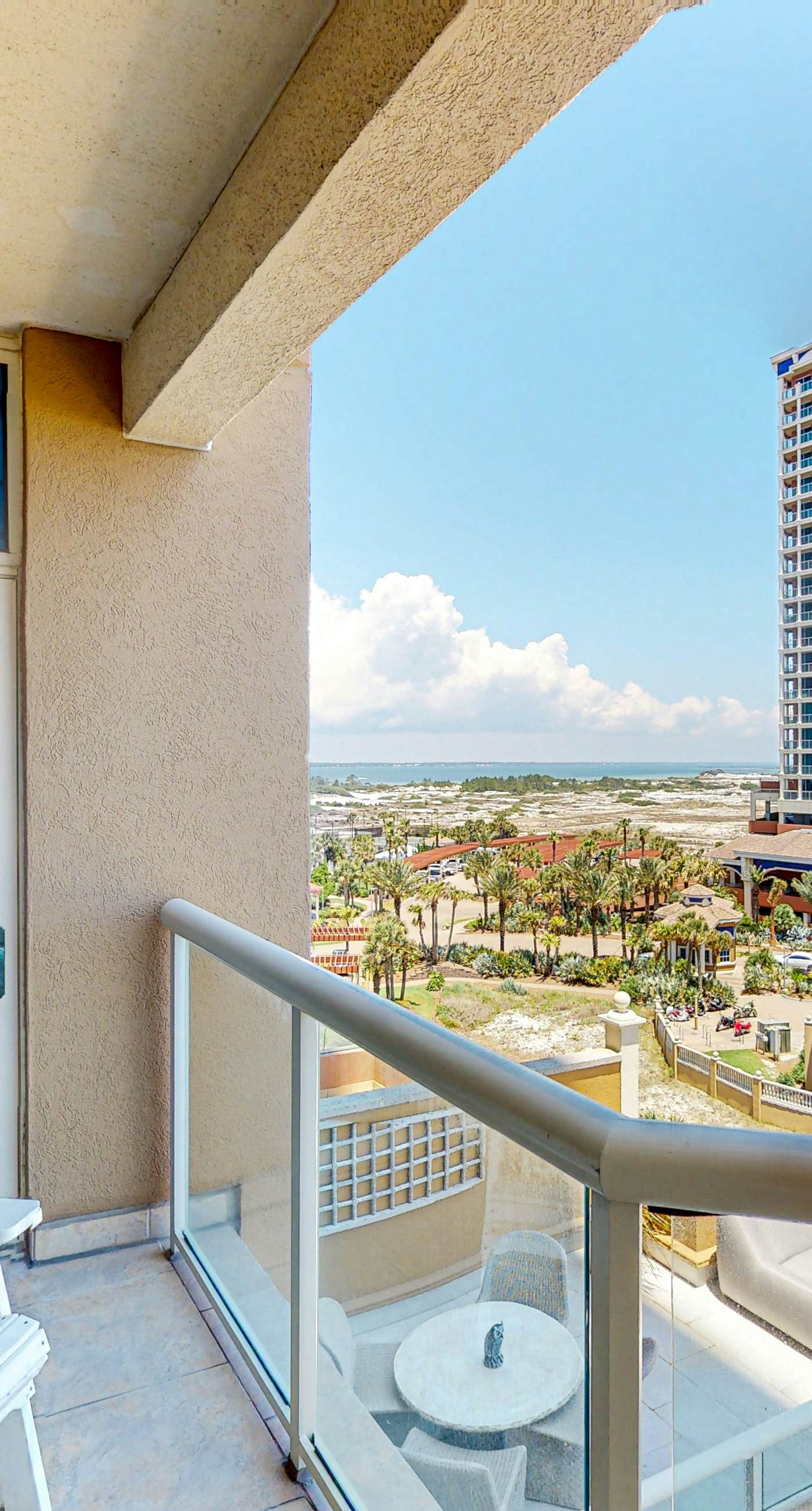 Gulf-view condo with pool, hot tub, beach access, tennis, balcony, AC, & W/D