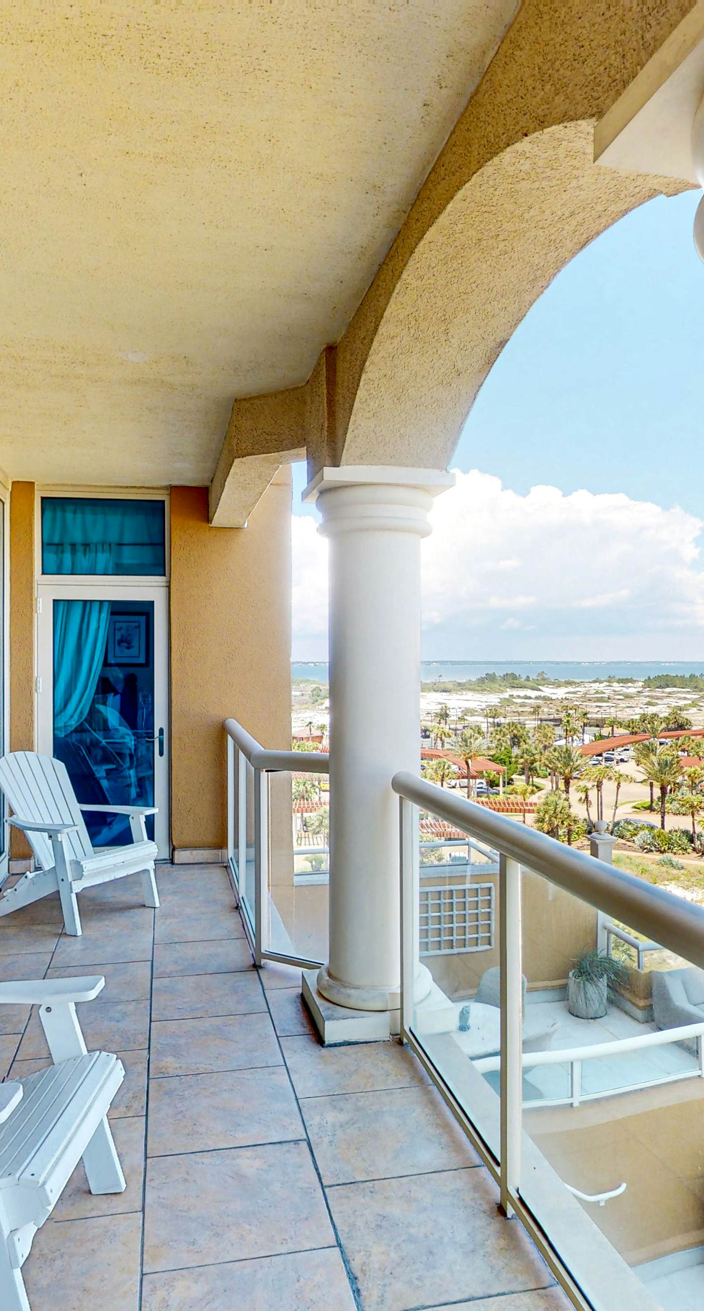 Gulf-view condo with pool, hot tub, beach access, tennis, balcony, AC, & W/D