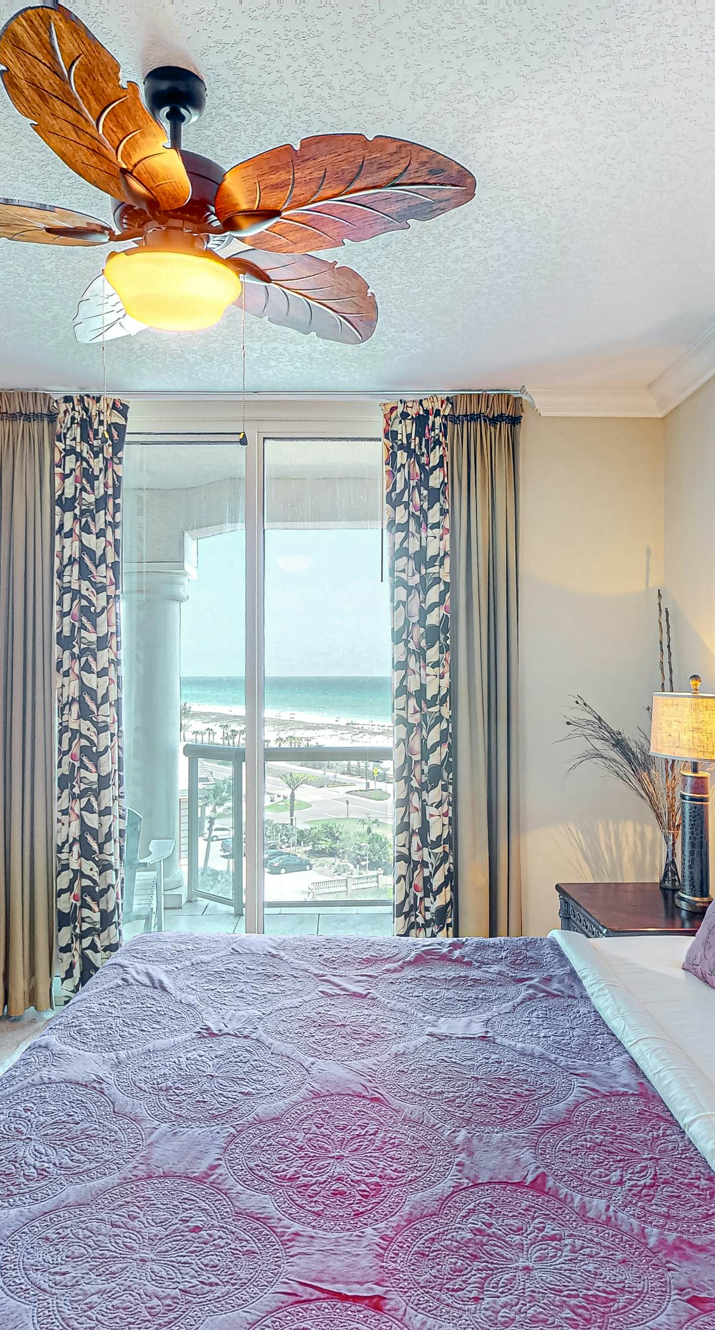 Gulf-view condo with pool, hot tub, beach access, tennis, balcony, AC, & W/D