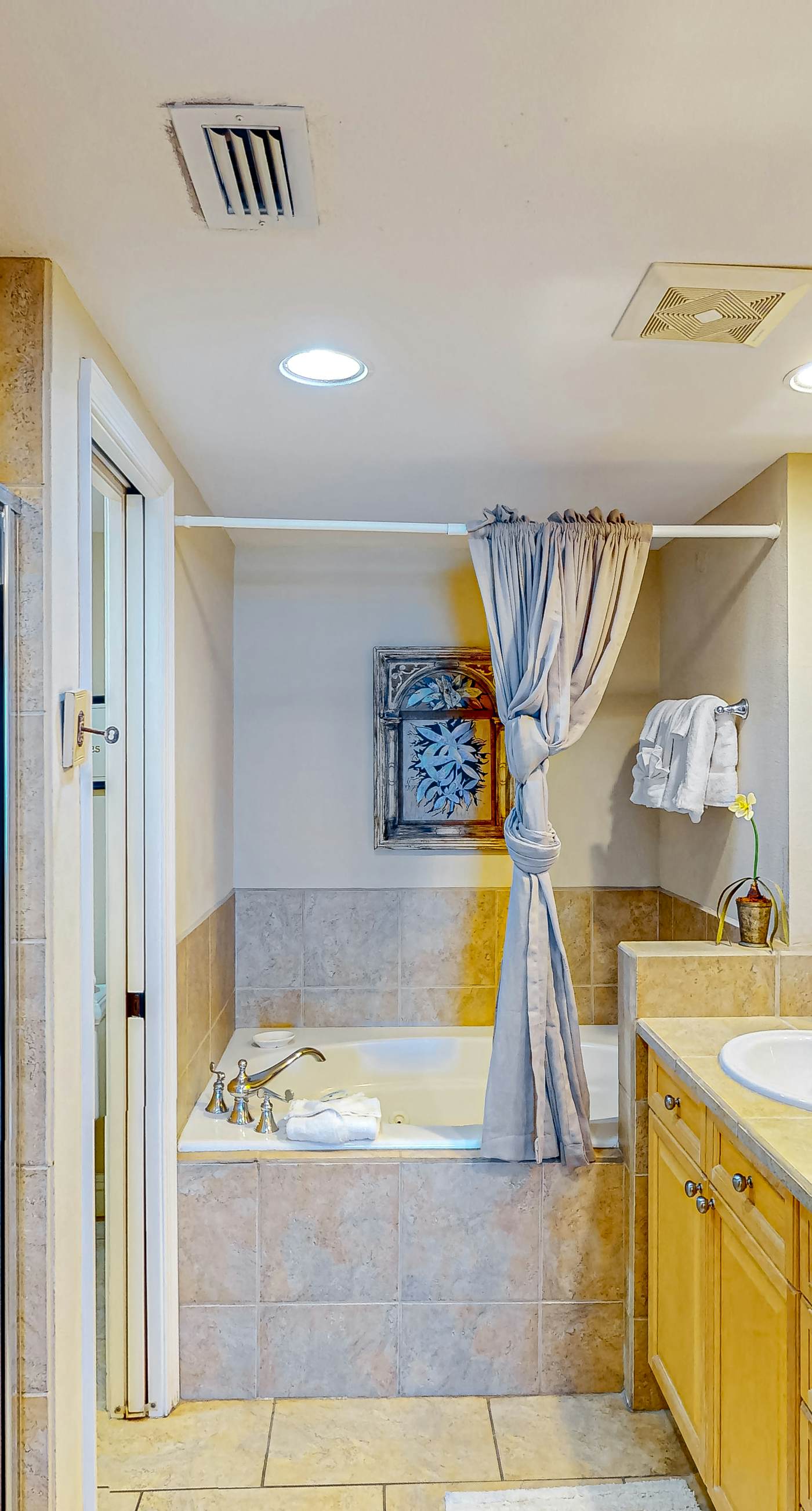 Gulf-view condo with pool, hot tub, beach access, tennis, balcony, AC, & W/D