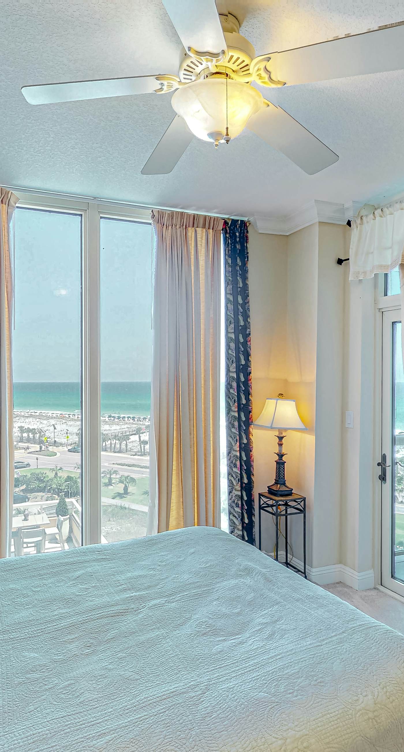 Gulf-view condo with pool, hot tub, beach access, tennis, balcony, AC, & W/D