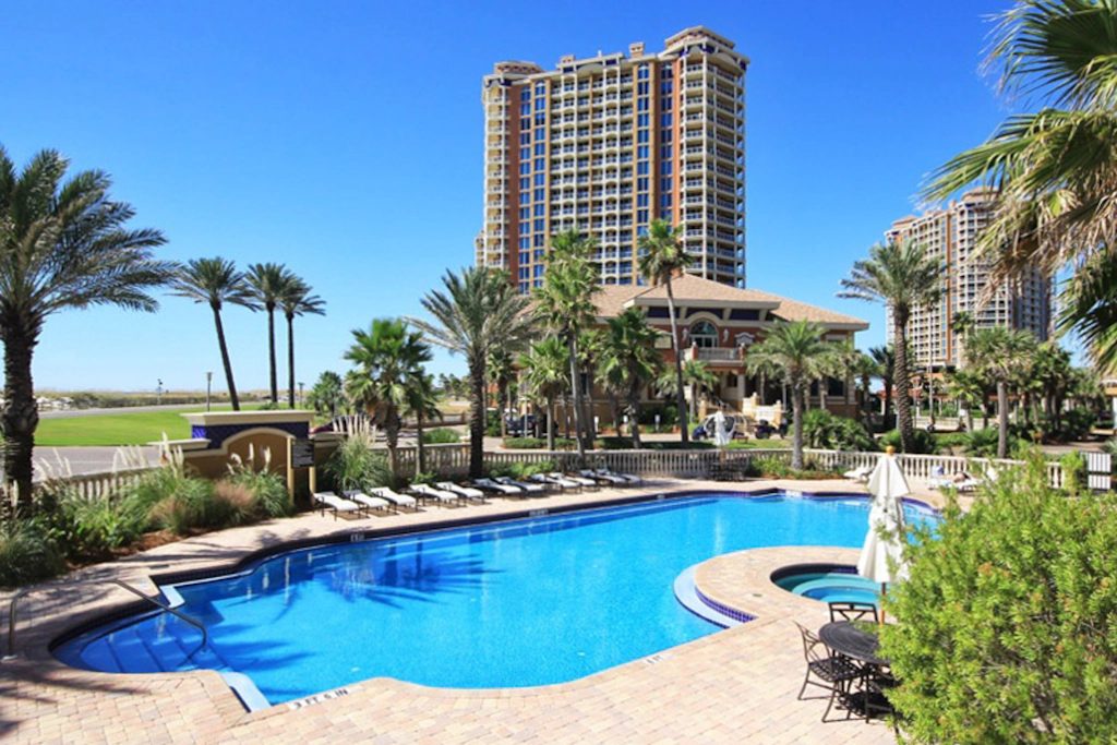 Gulf-view condo with pool, hot tub, beach access, tennis, balcony, AC, & W/D