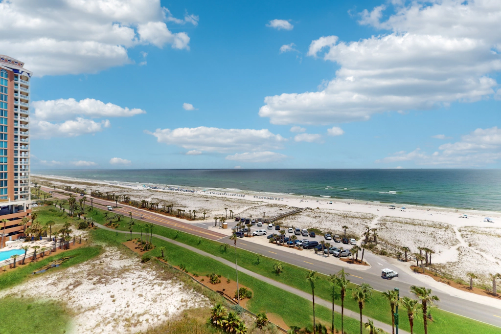 Gulf-view condo with pool, hot tub, beach access, tennis, balcony, AC, & W/D