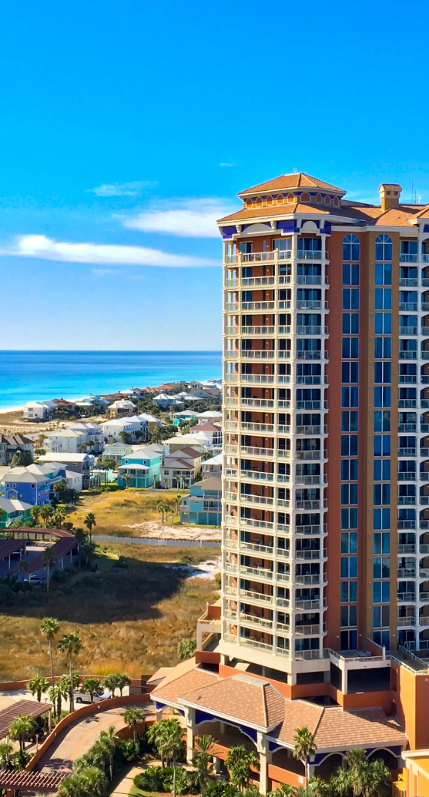Gulf-view condo with pool, hot tub, beach access, tennis, balcony, AC, & W/D