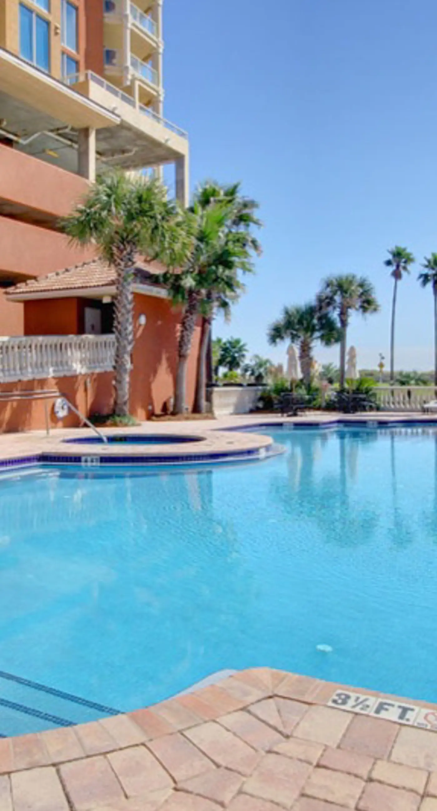 Gulf-view condo with pool, hot tub, beach access, tennis, balcony, AC, & W/D
