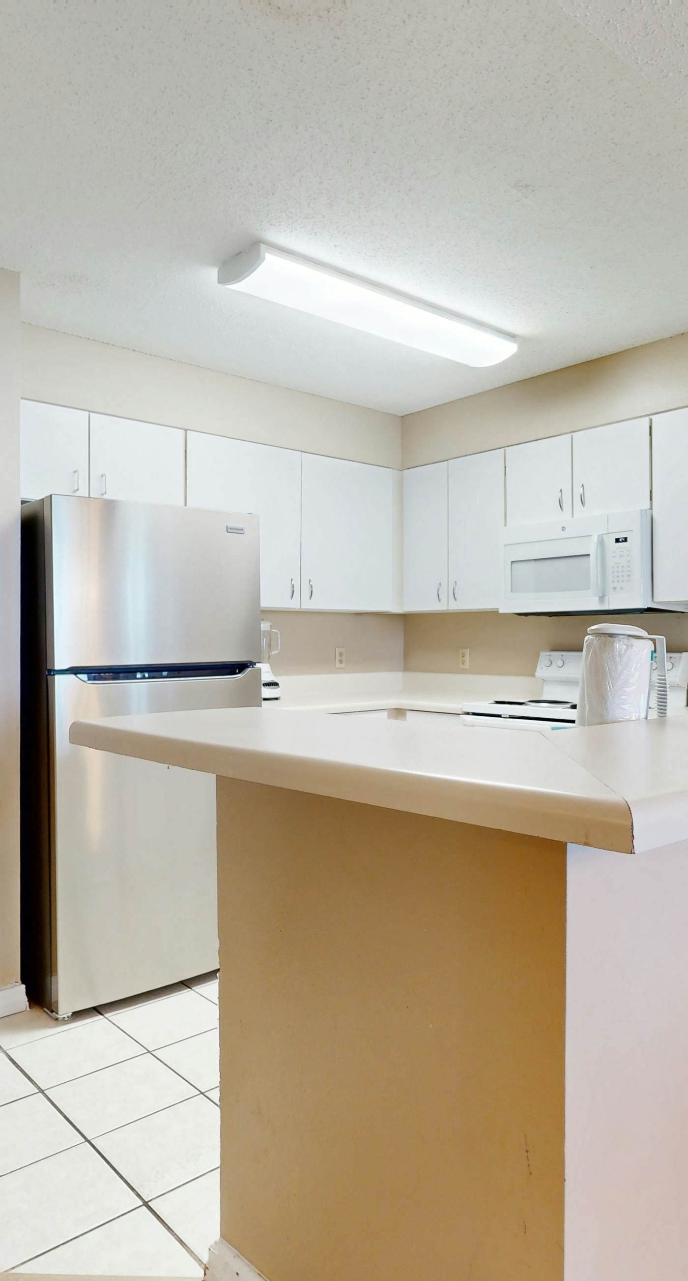 Gulf condo with fitness room, pool & hot tub