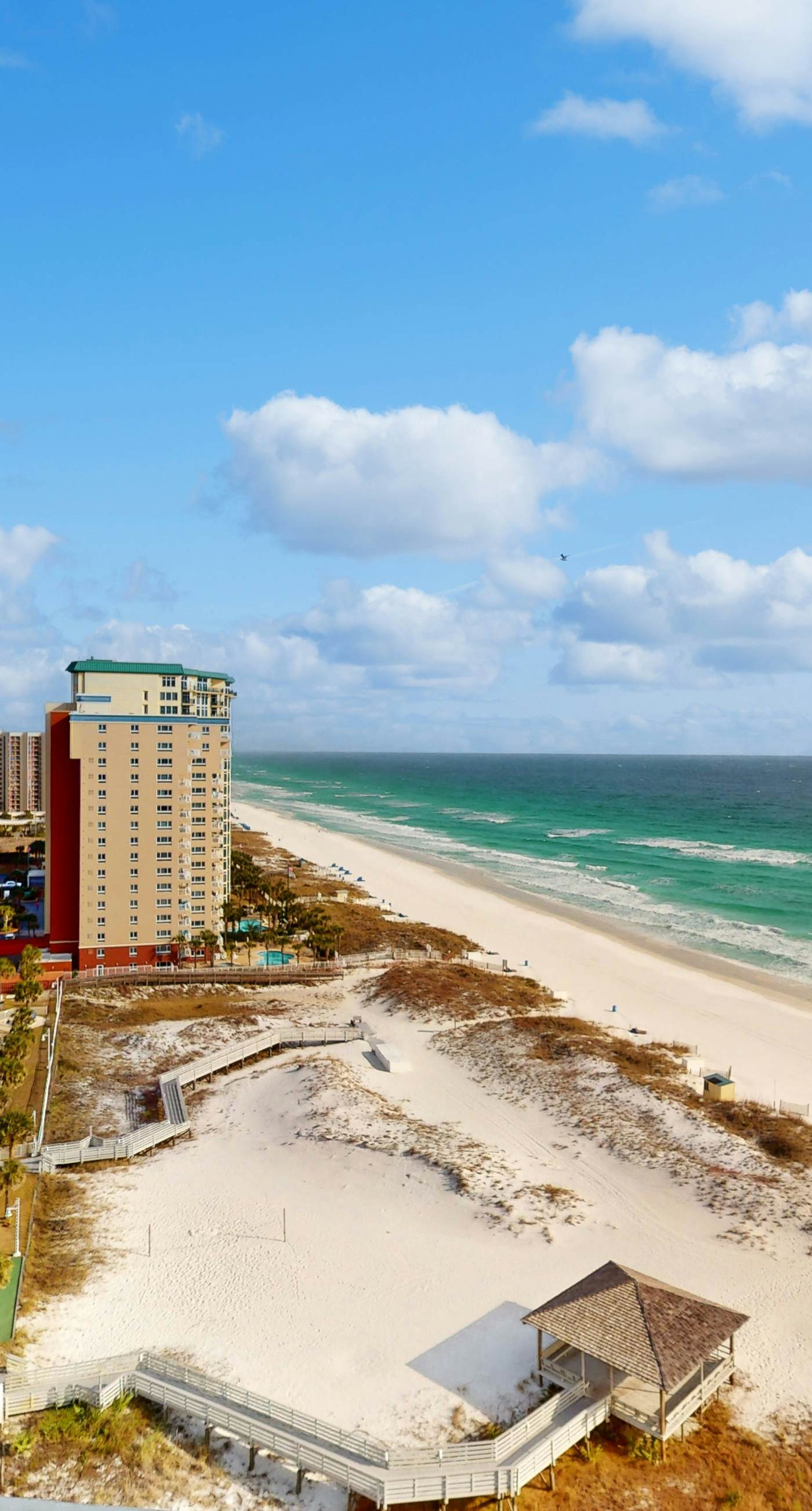 Gulf condo with fitness room, pool & hot tub
