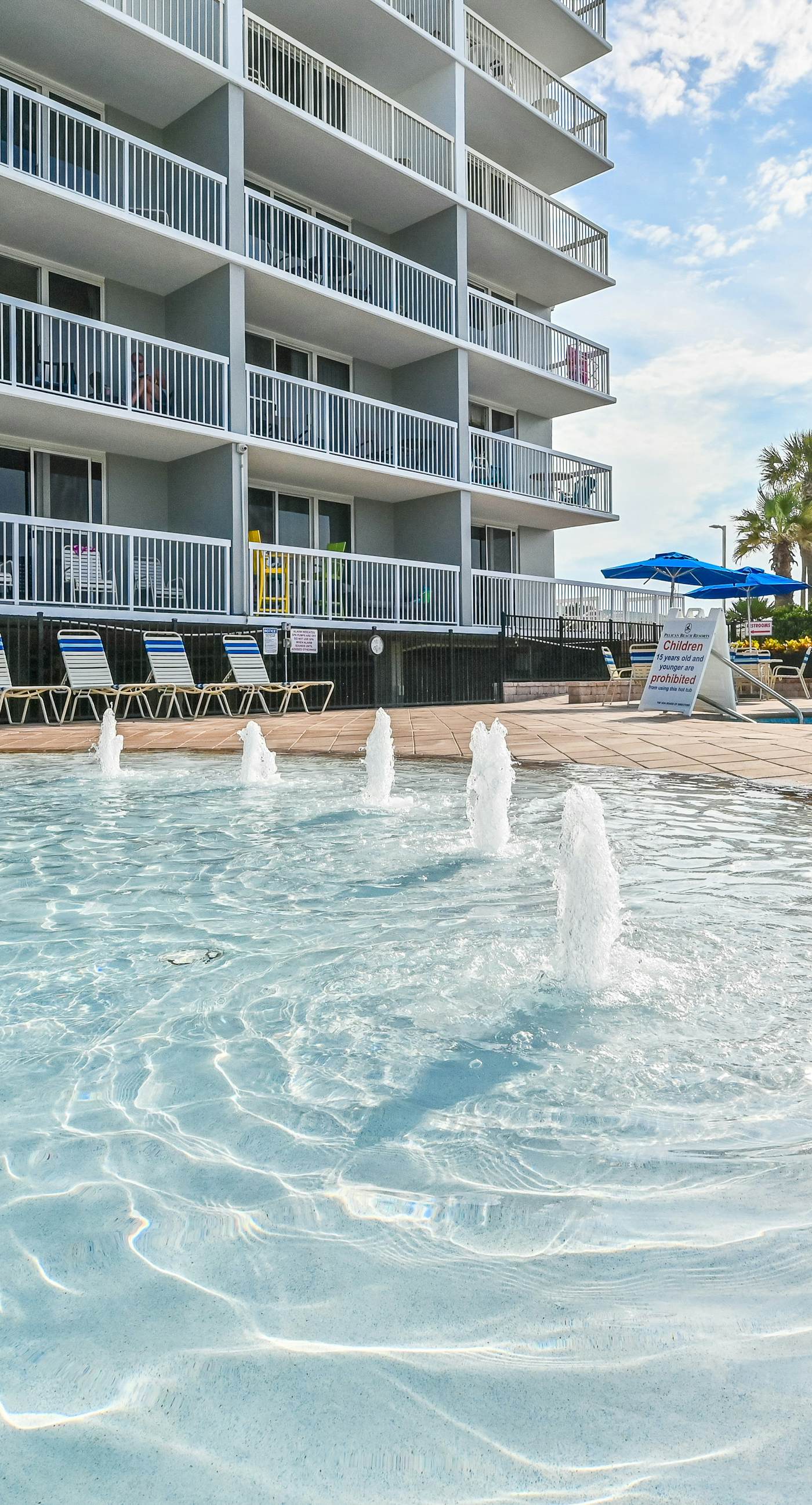 Gulf condo with fitness room, pool & hot tub