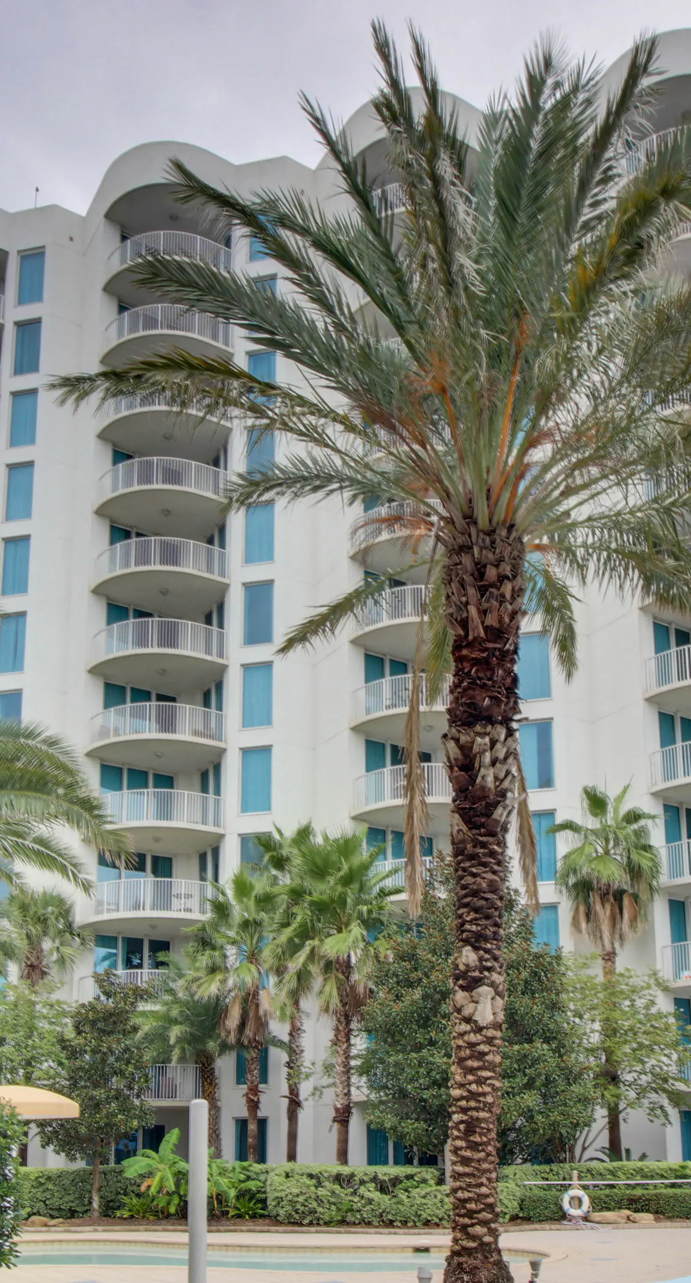 Gorgeous coastal condo with balcony & resort pools - close to beach
