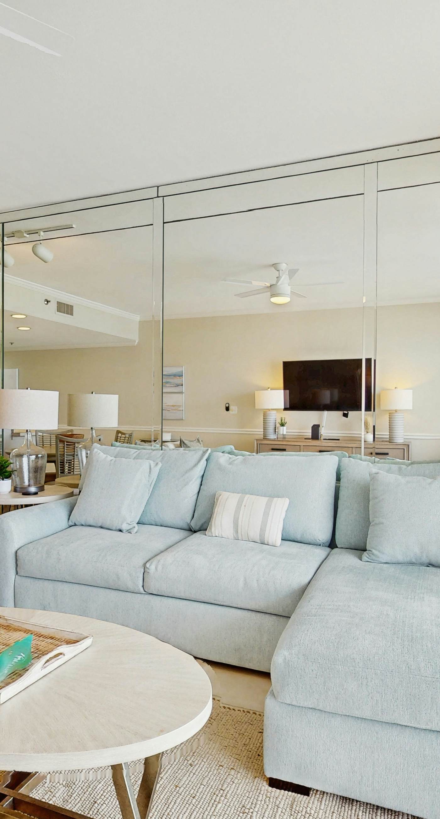 Stunning waterfront home with convenient beach access, pool & gym