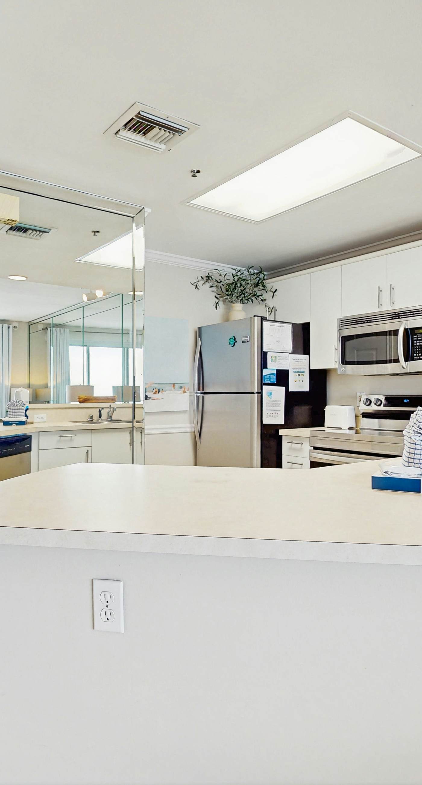 Stunning waterfront home with convenient beach access, pool & gym