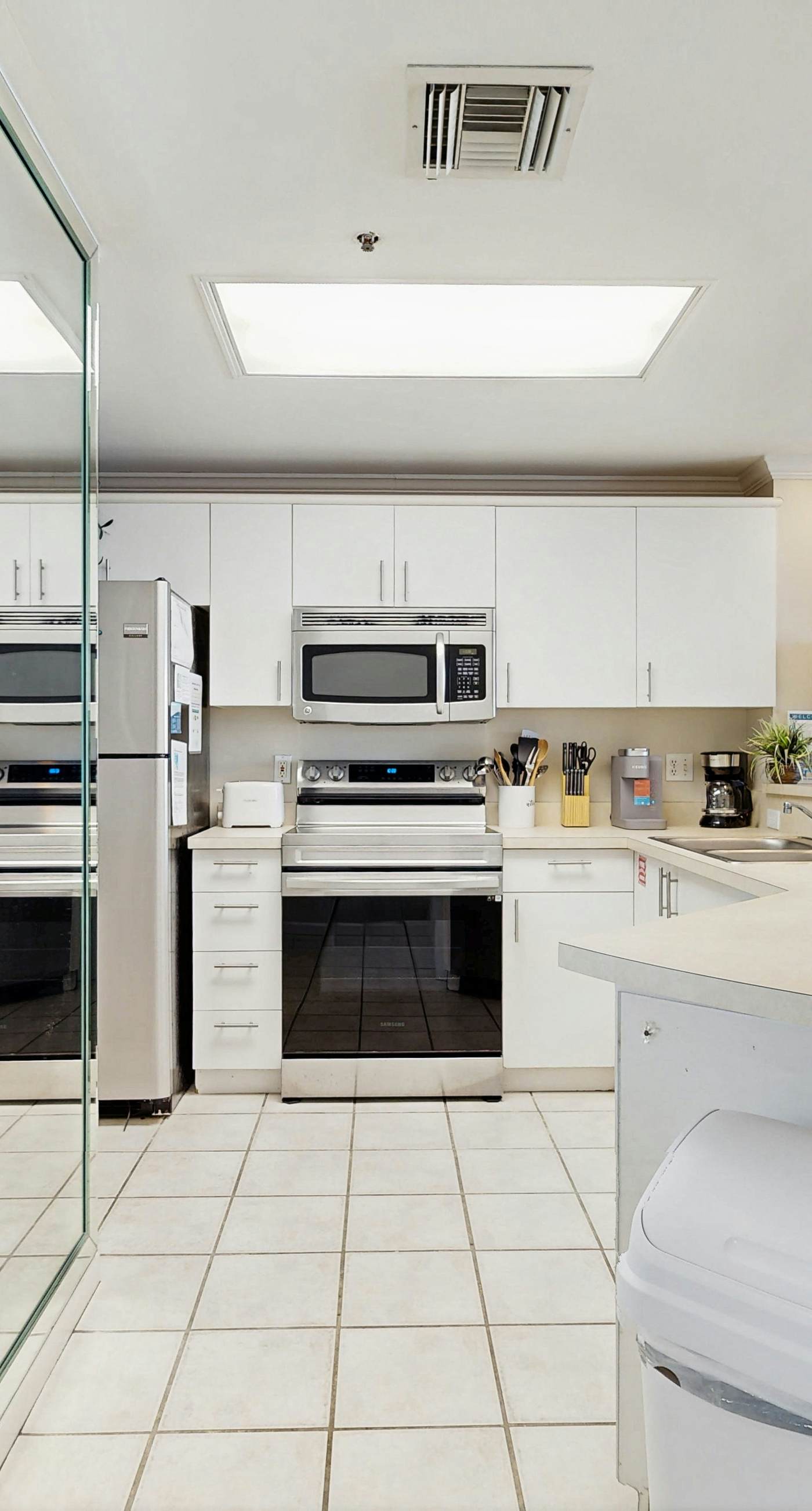 Stunning waterfront home with convenient beach access, pool & gym