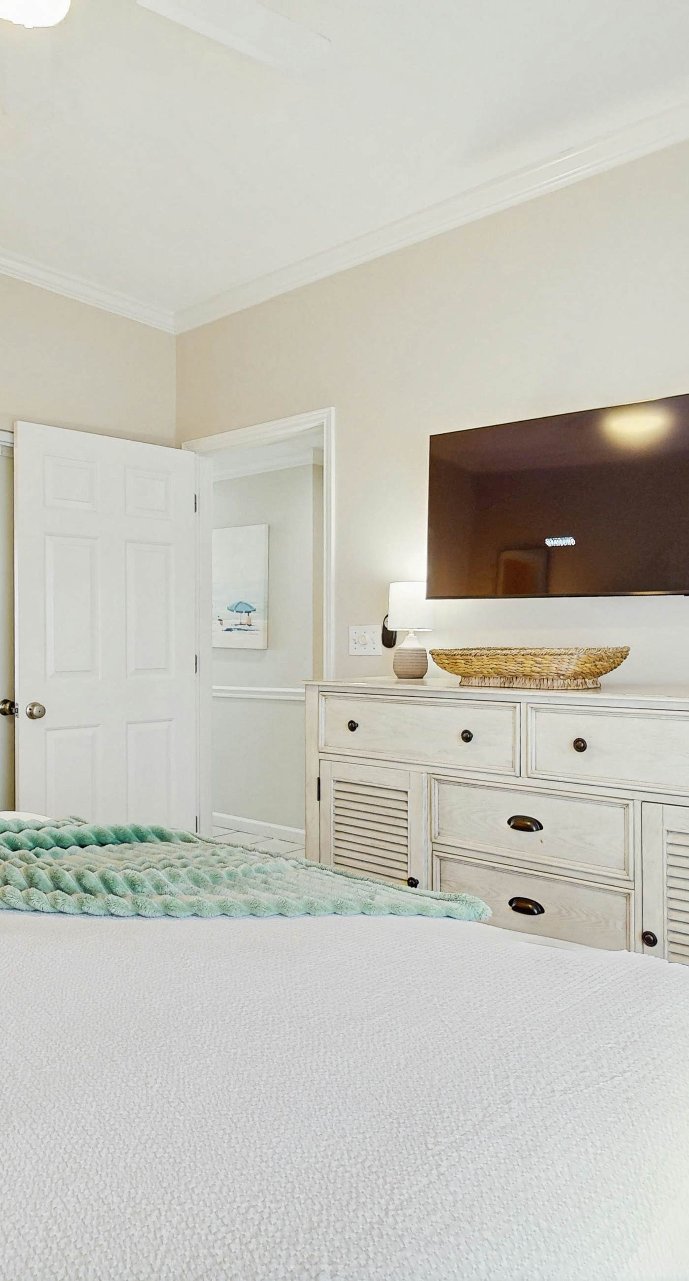 Stunning waterfront home with convenient beach access, pool & gym