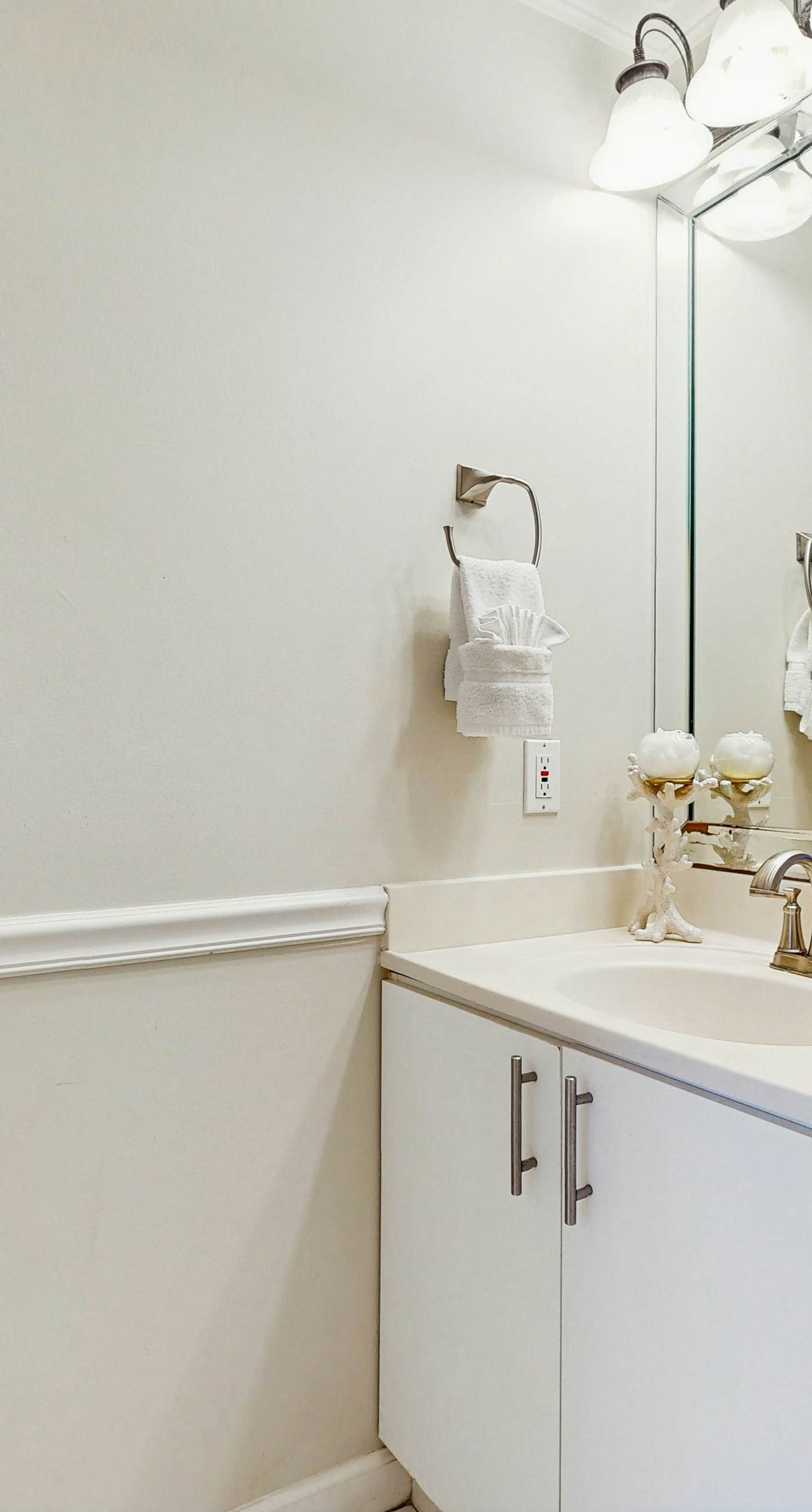 Stunning waterfront home with convenient beach access, pool & gym