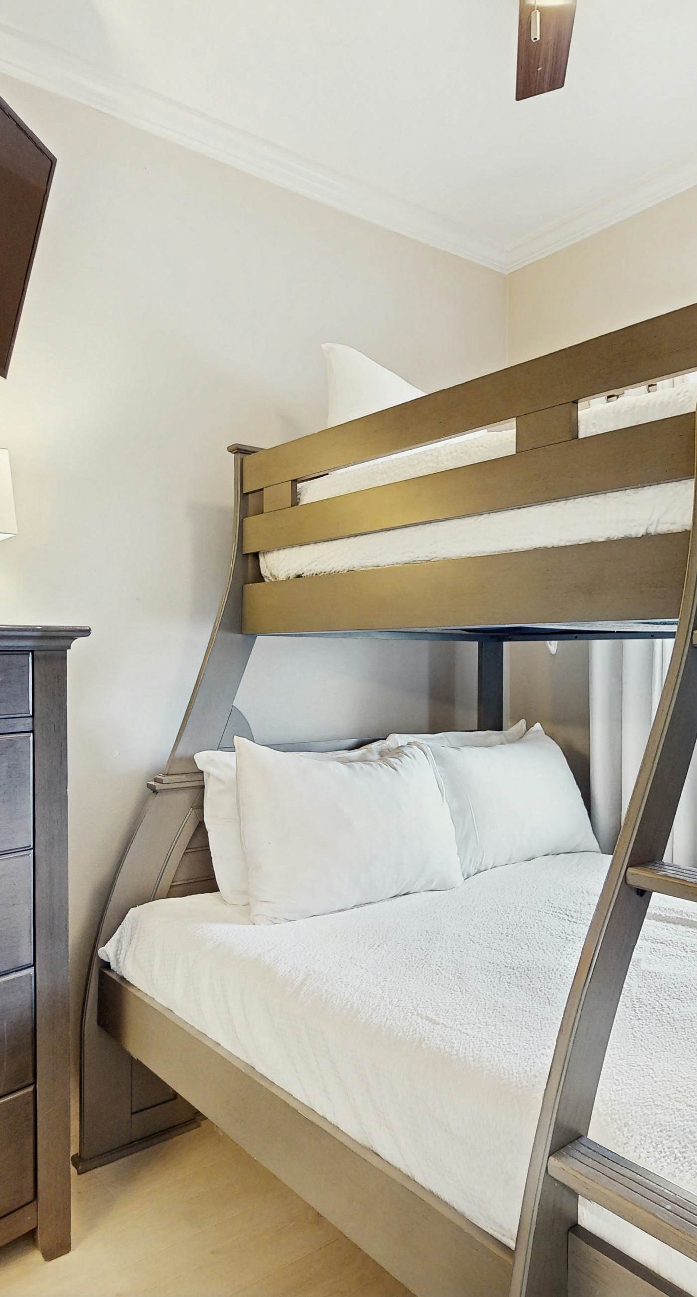 Stunning waterfront home with convenient beach access, pool & gym