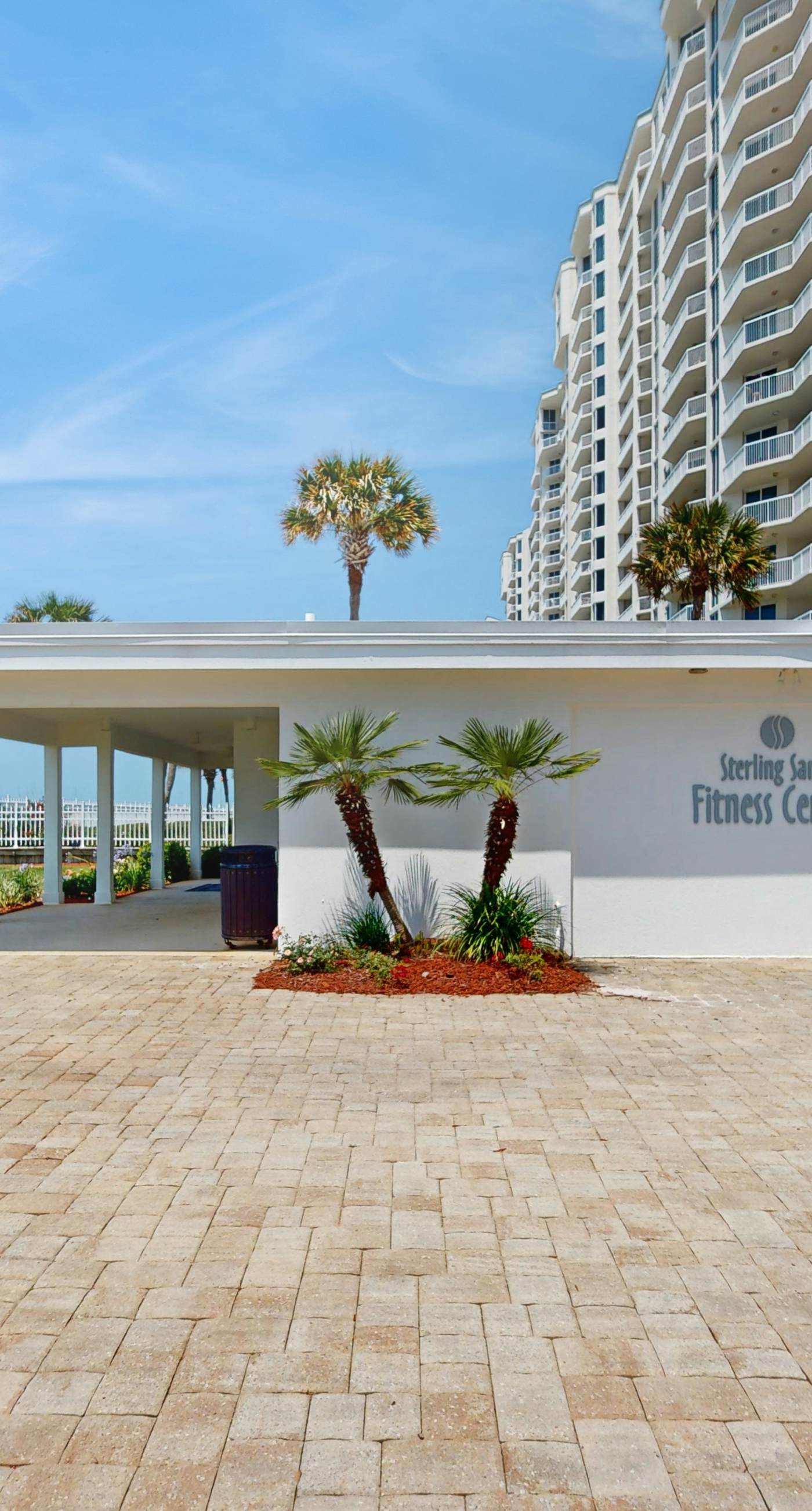 Stunning waterfront home with convenient beach access, pool & gym