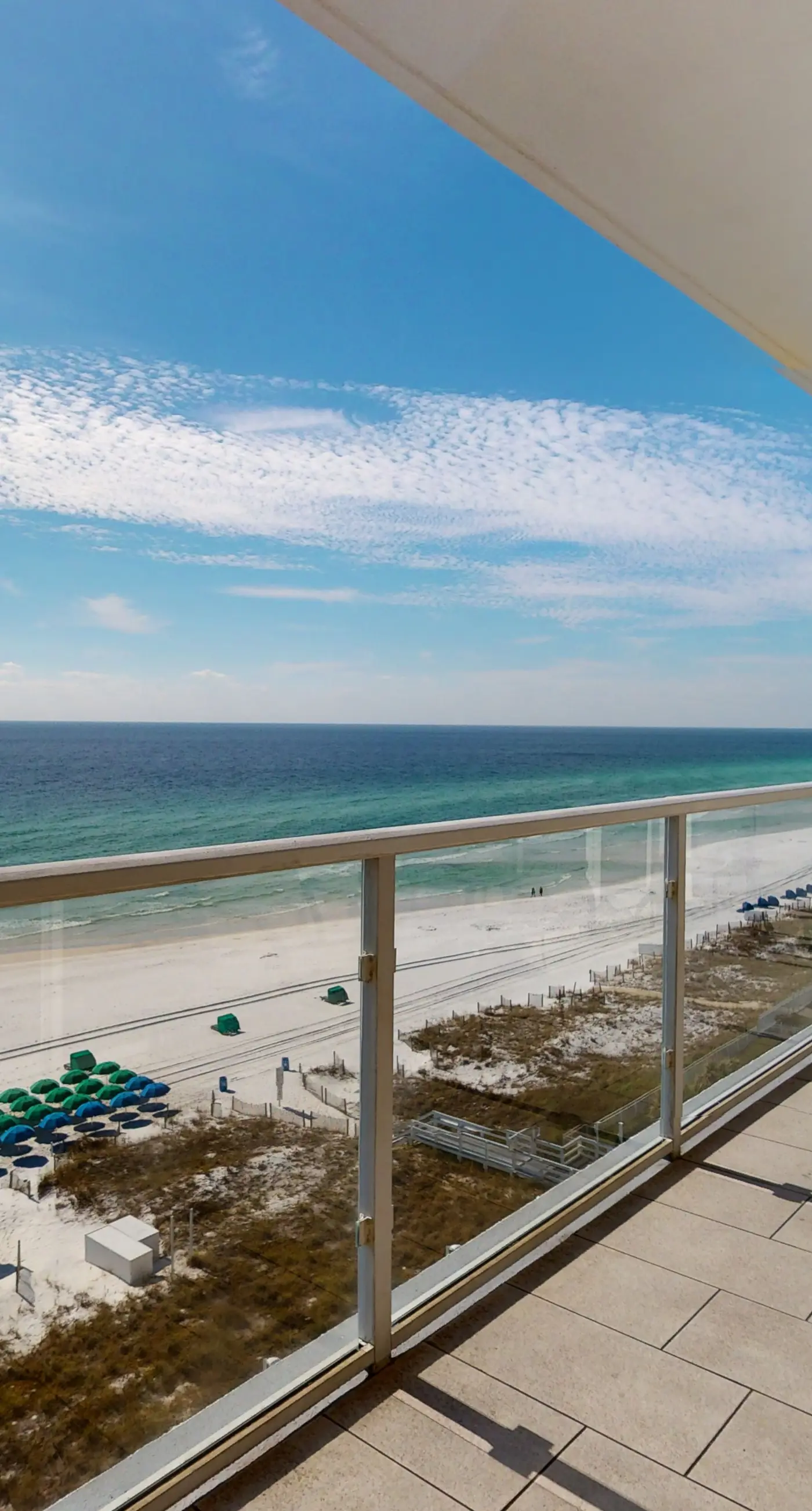 Vibrant condo on the Gulf with pool, fitness room & playground
