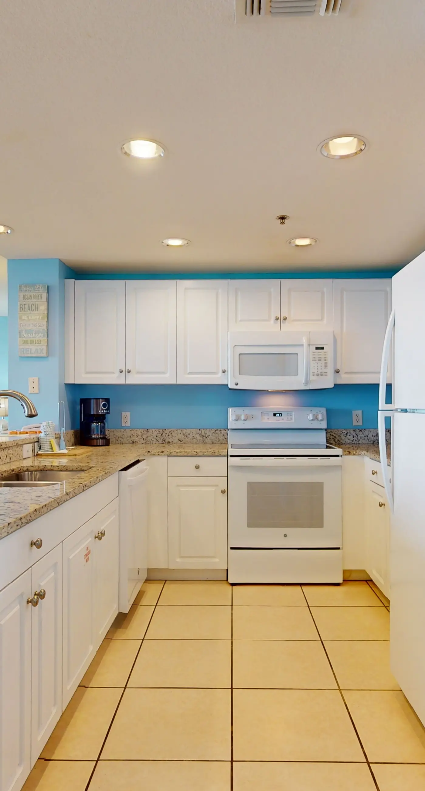 Gulf-view Sterling Shores condo with pool, gym & beach access