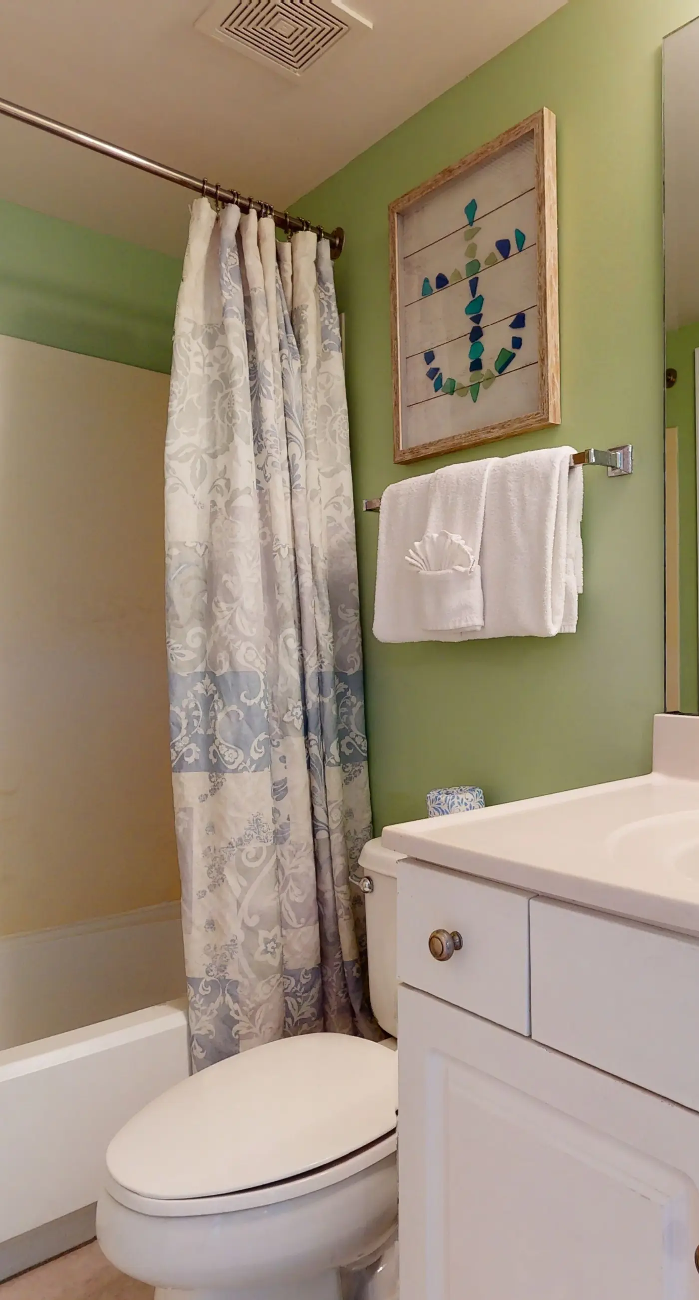 Gulf-view Sterling Shores condo with pool, gym & beach access