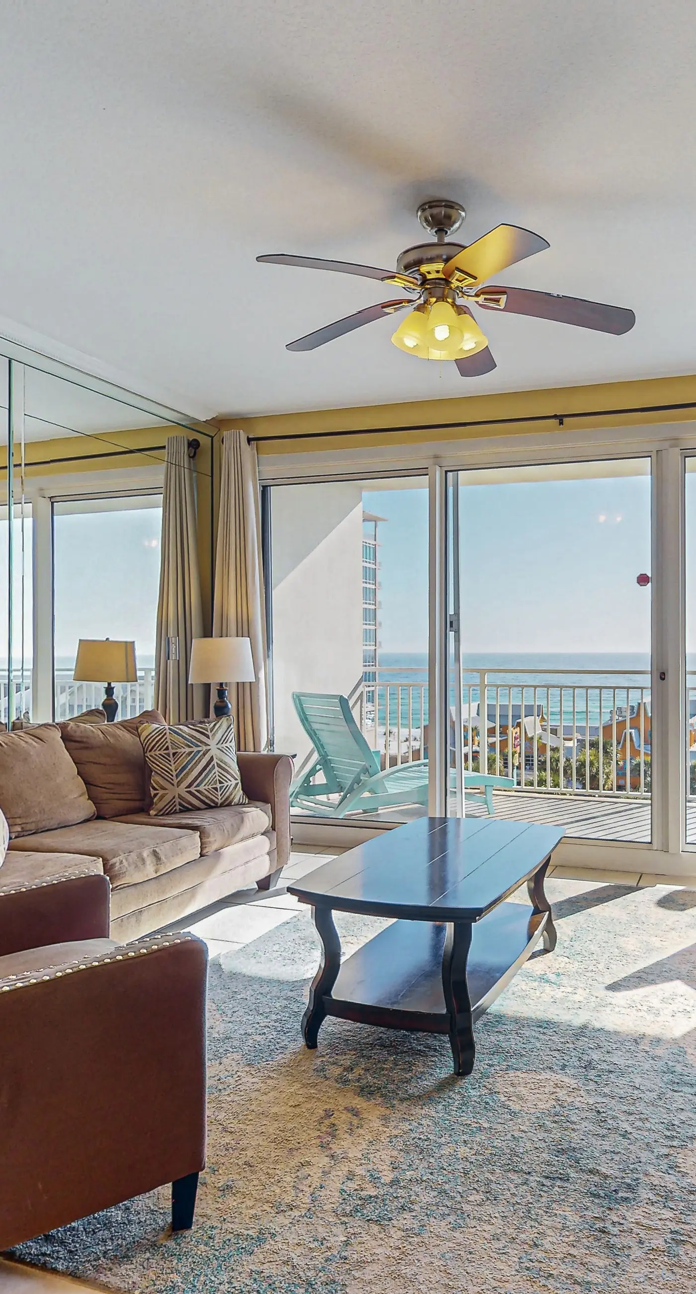 Inviting & sleek condo w/private balcony, shared pool, grill & fitness center