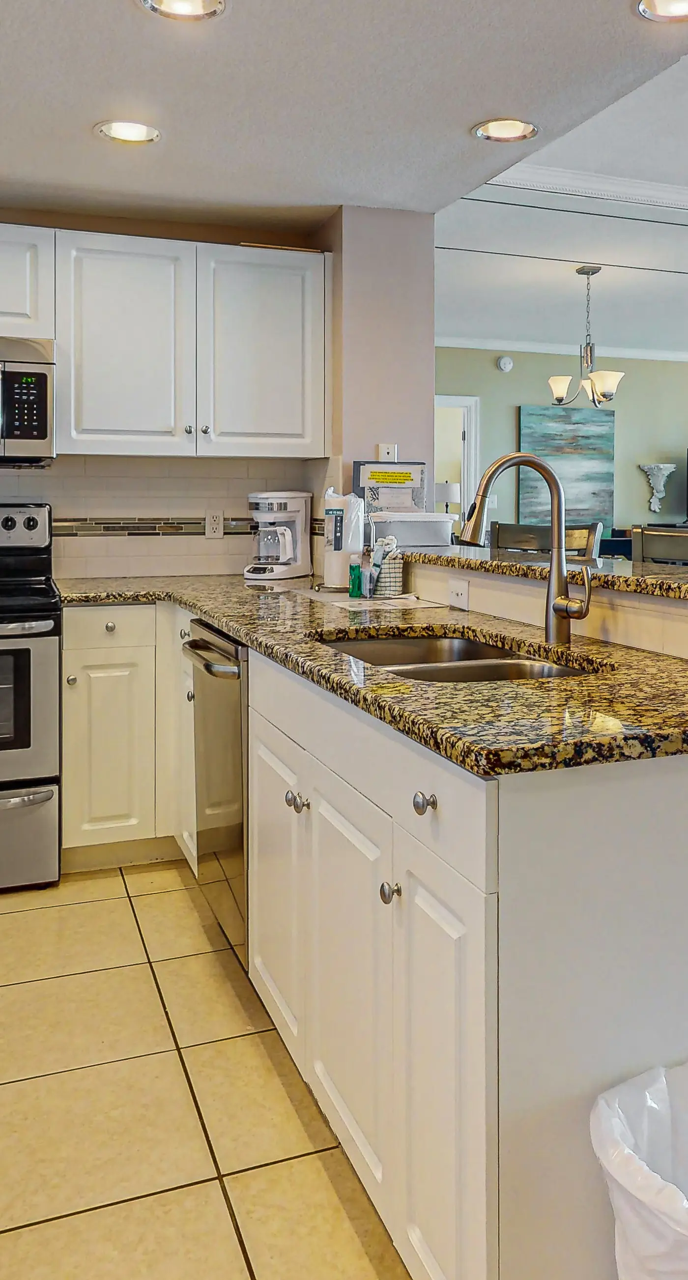 Inviting & sleek condo w/private balcony, shared pool, grill & fitness center