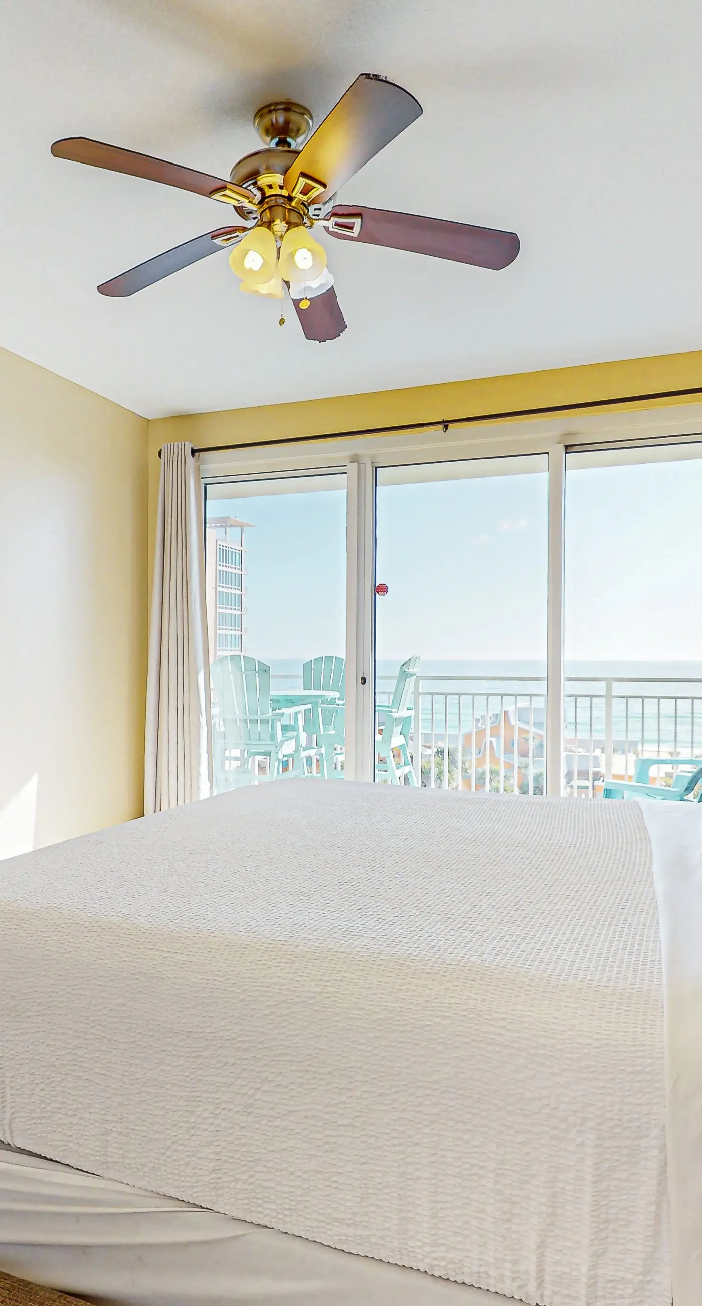 Inviting & sleek condo w/private balcony, shared pool, grill & fitness center
