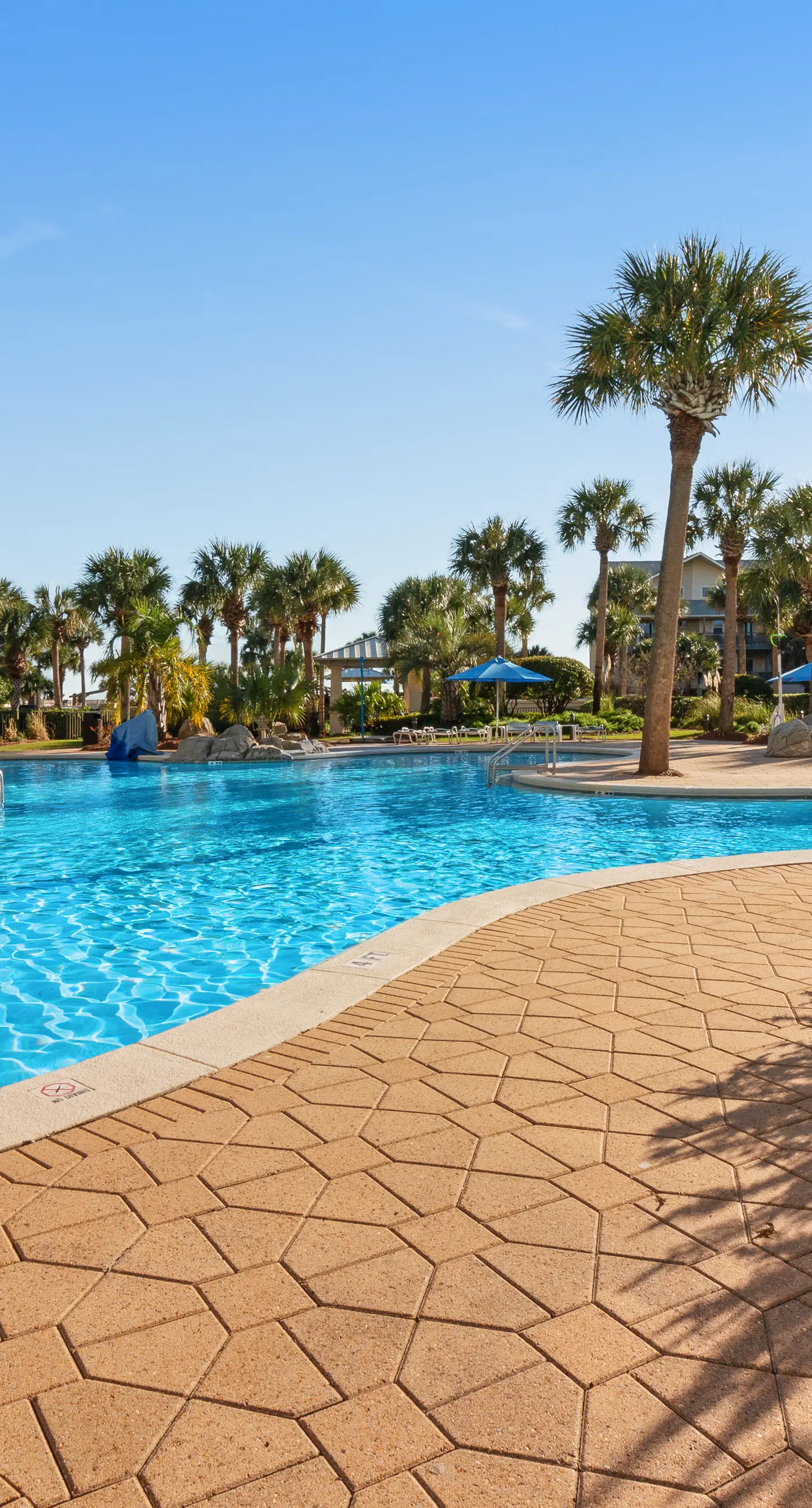 Inviting & sleek condo w/private balcony, shared pool, grill & fitness center