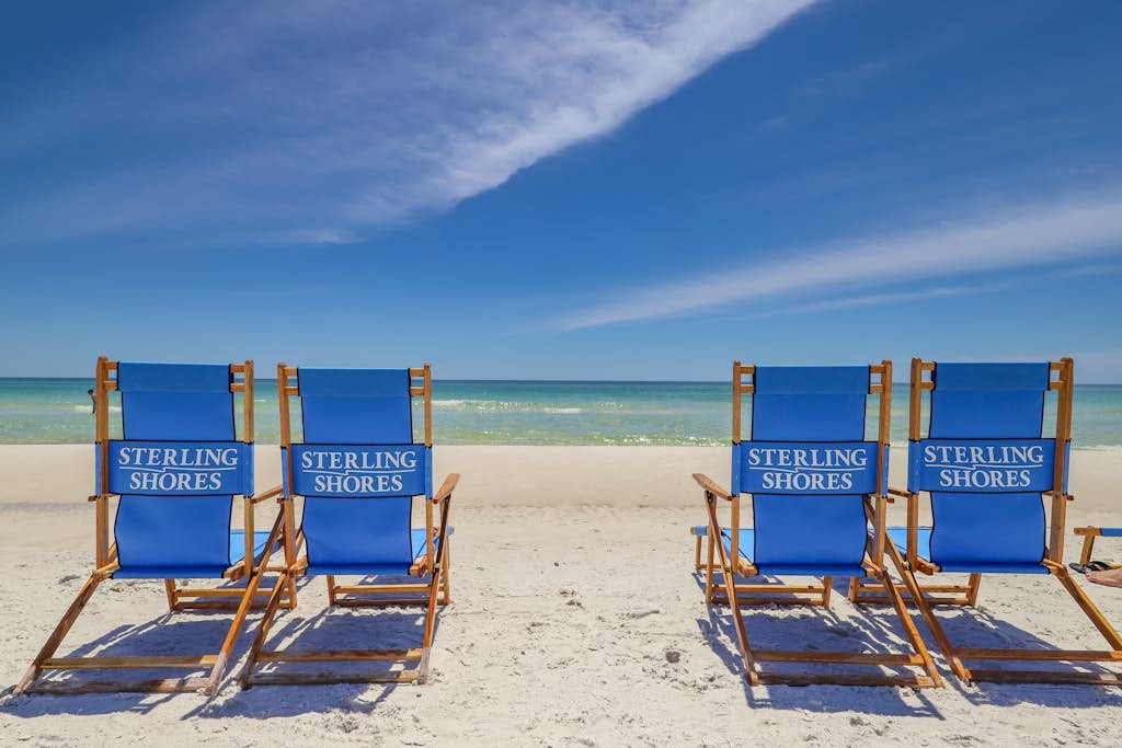 Bright beach condo with water views & private balcony - pool, gym & beach