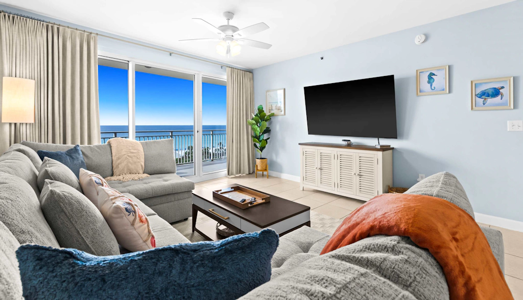 Bright beach condo with water views & private balcony - pool, gym & beach