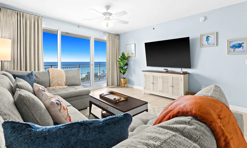 Bright beach condo with water views & private balcony - pool, gym & beach