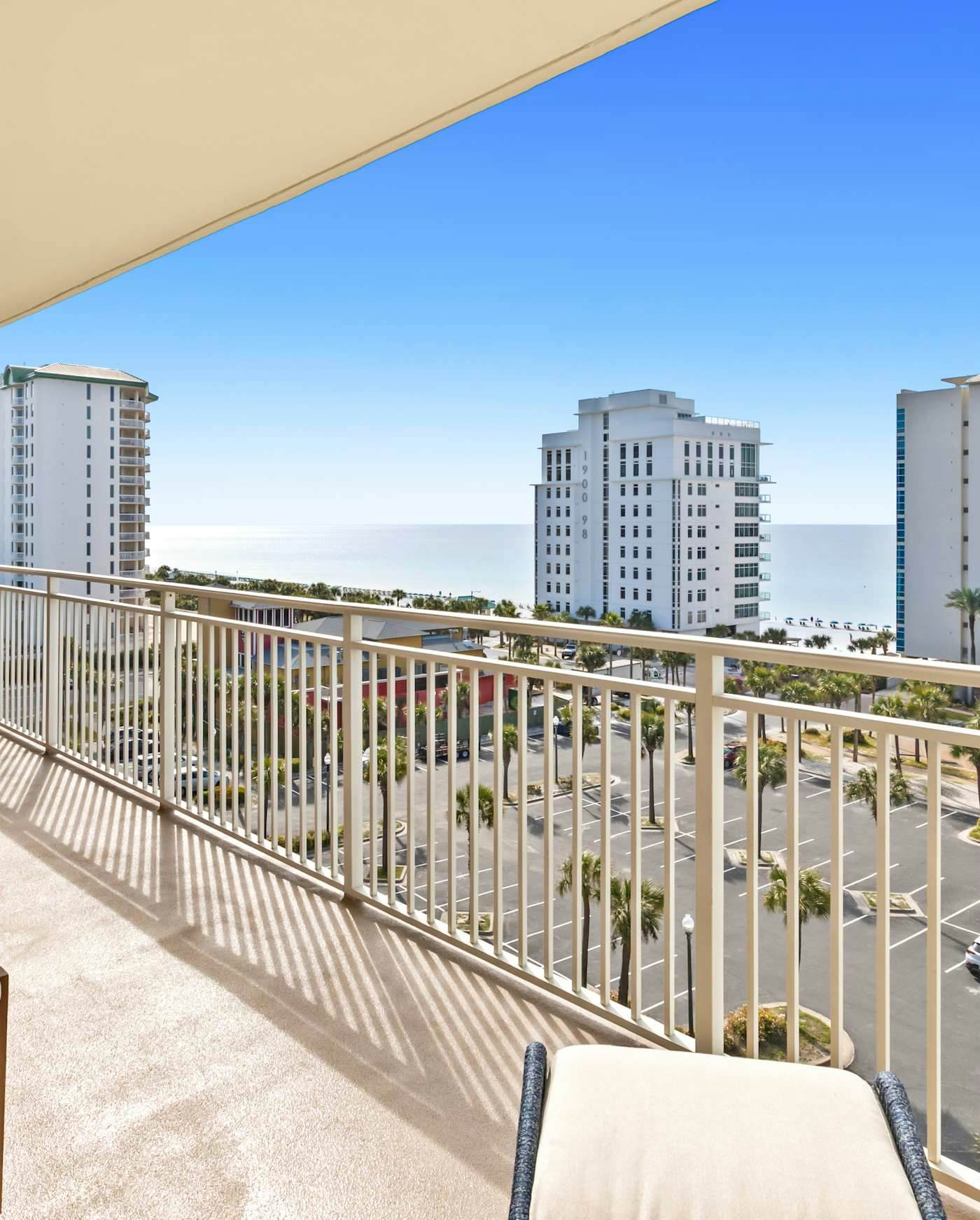 Bright beach condo with water views & private balcony - pool, gym & beach