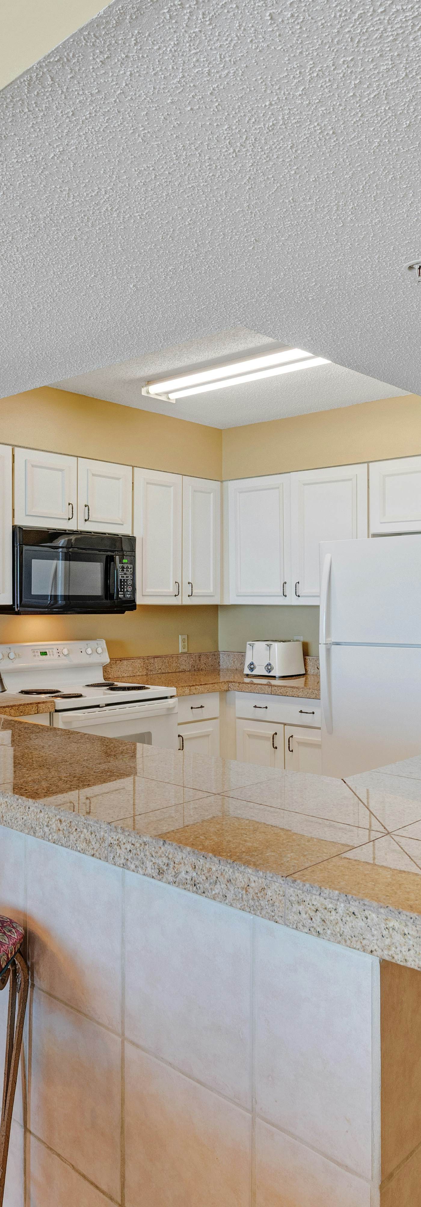 Ocean-view condo with central AC, pool & hot tub access & balcony