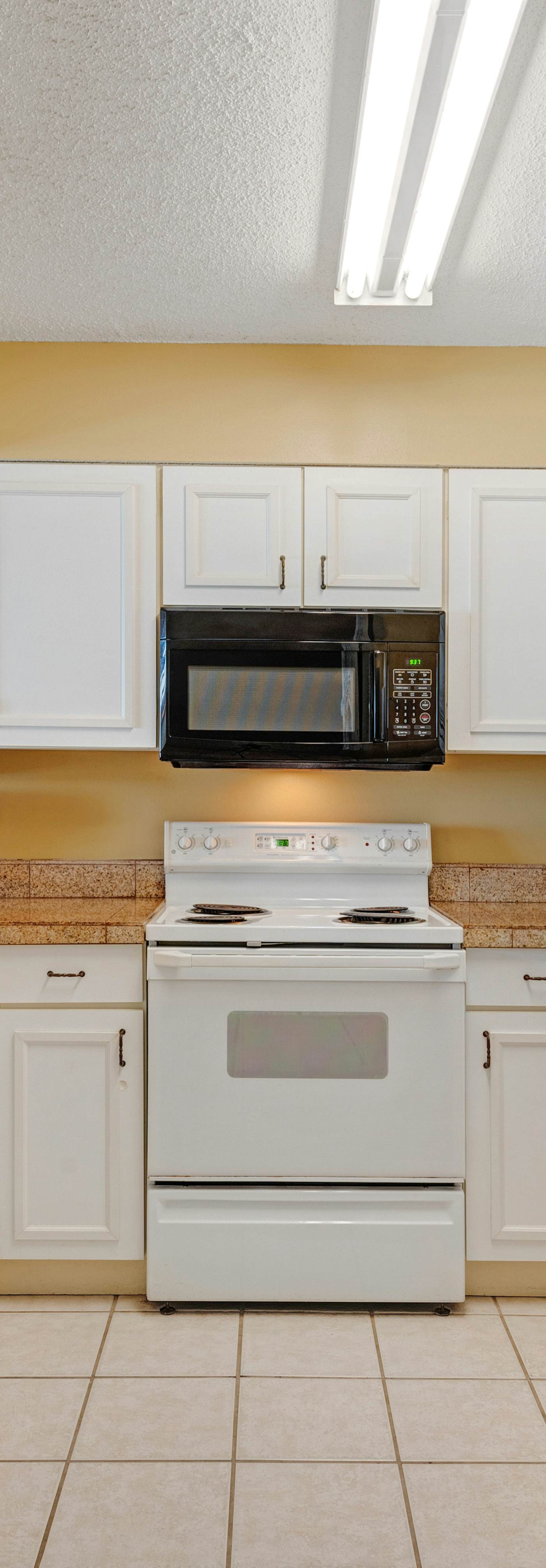 Ocean-view condo with central AC, pool & hot tub access & balcony