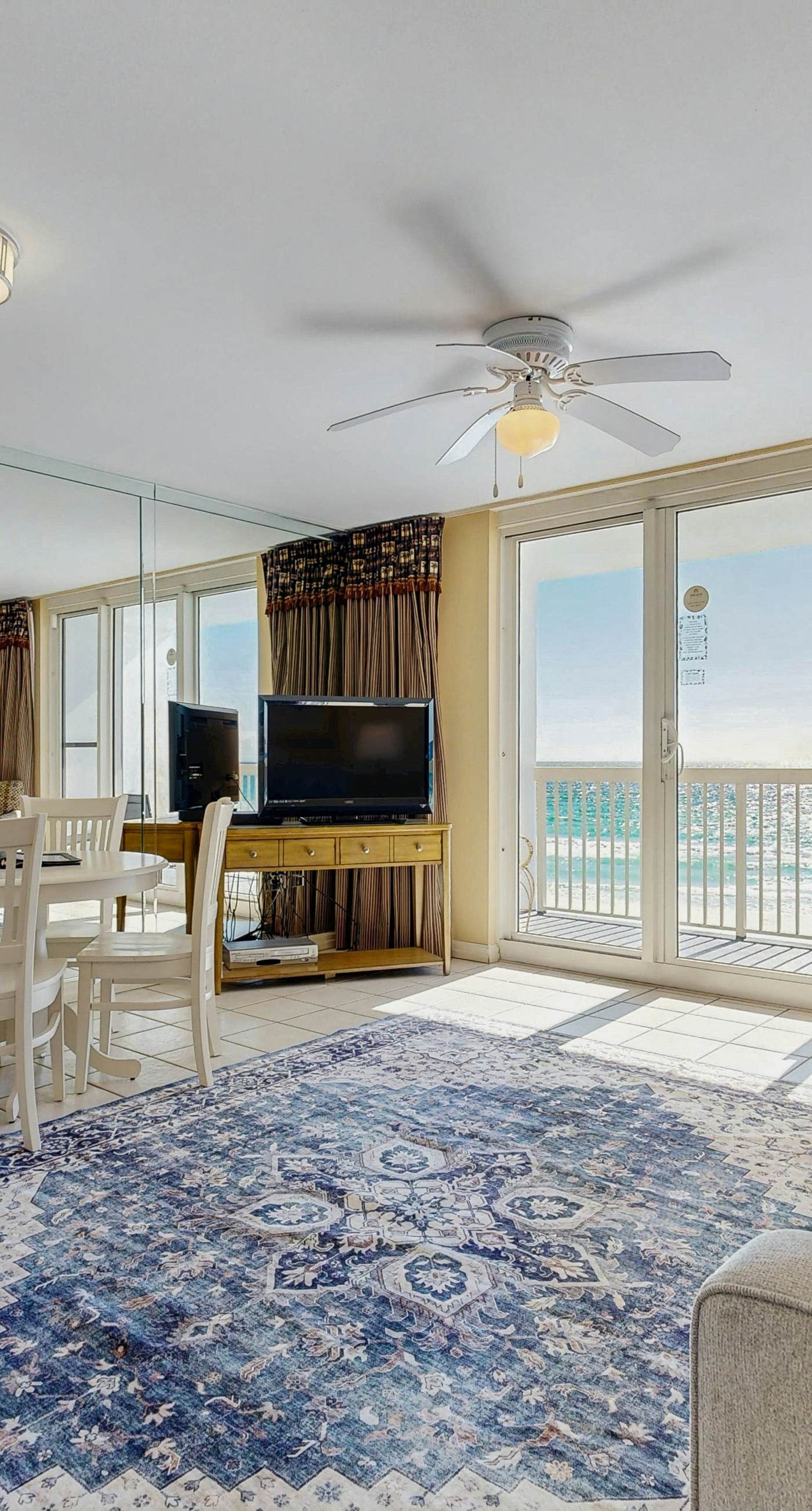 5th-floor condo with patio, pool & ocean views