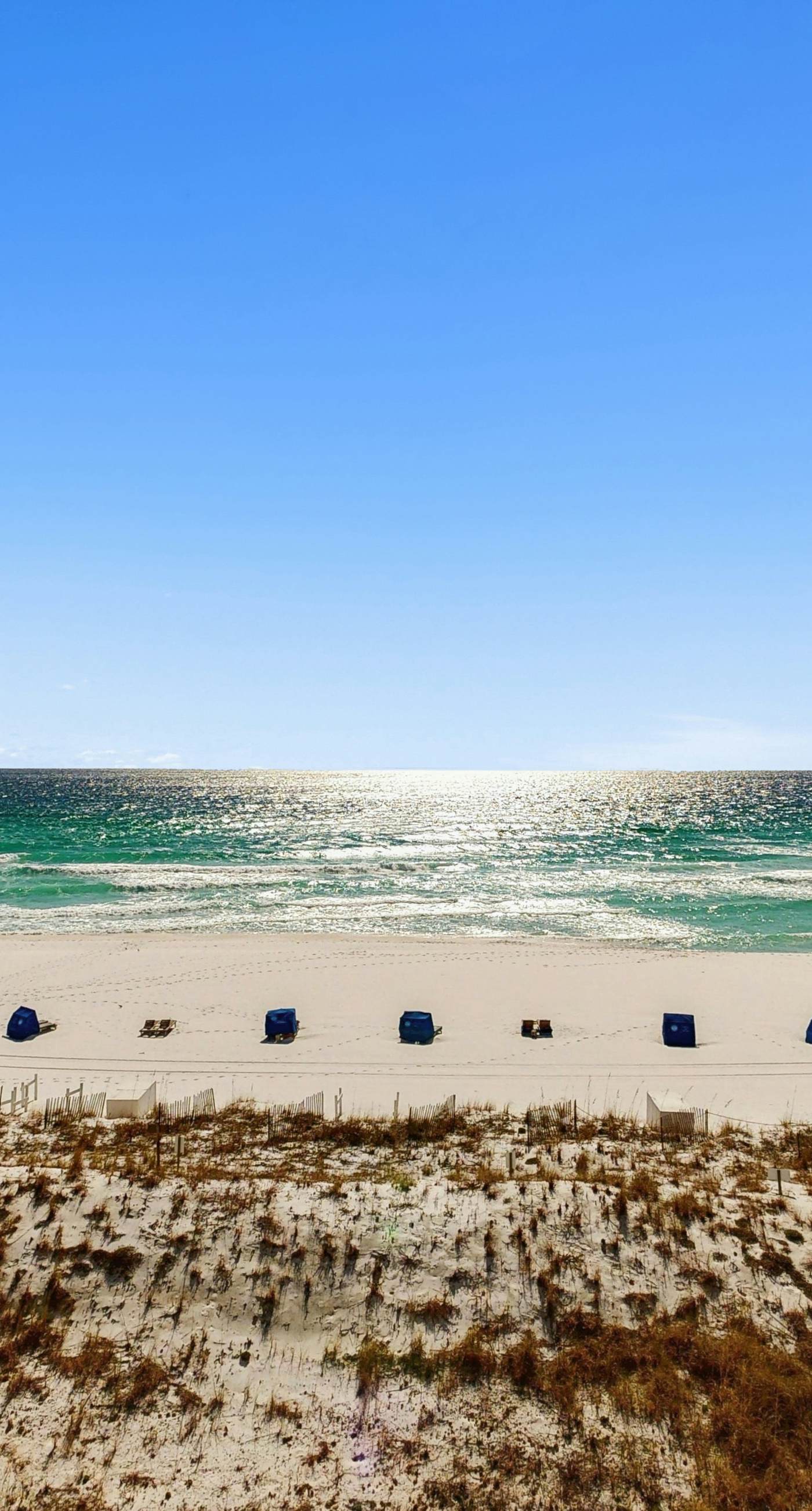 5th-floor condo with patio, pool & ocean views