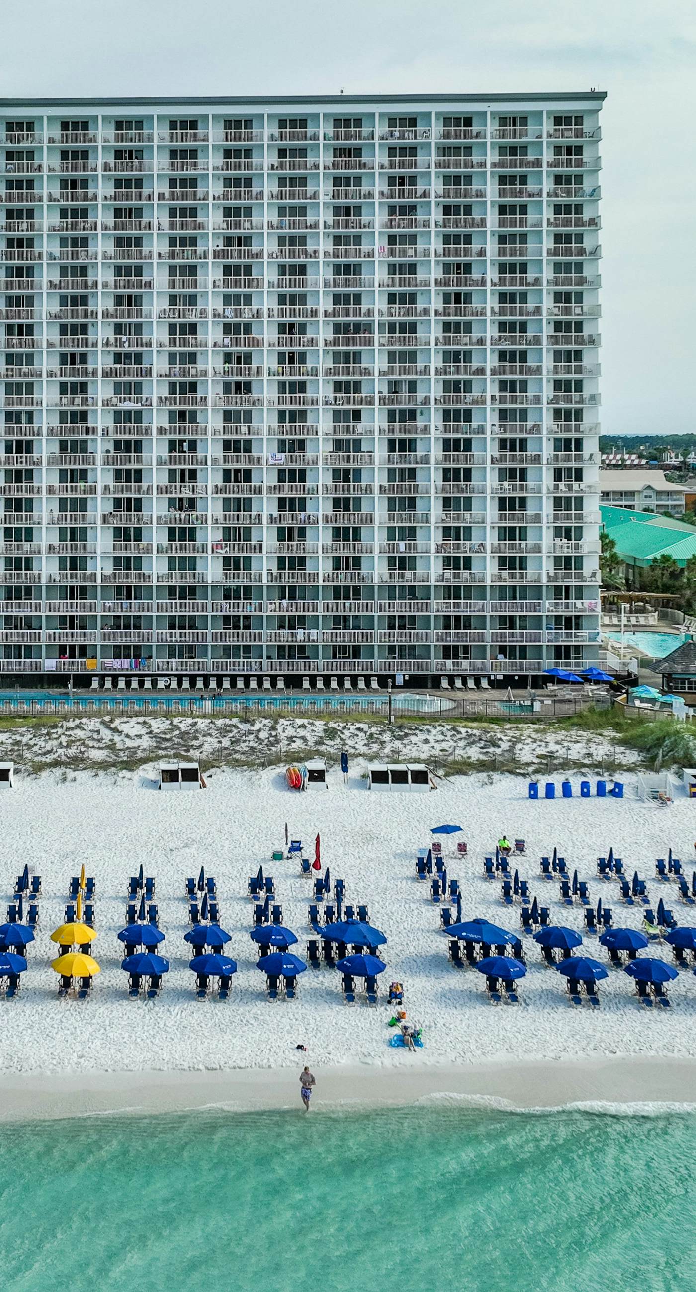 5th-floor condo with patio, pool & ocean views