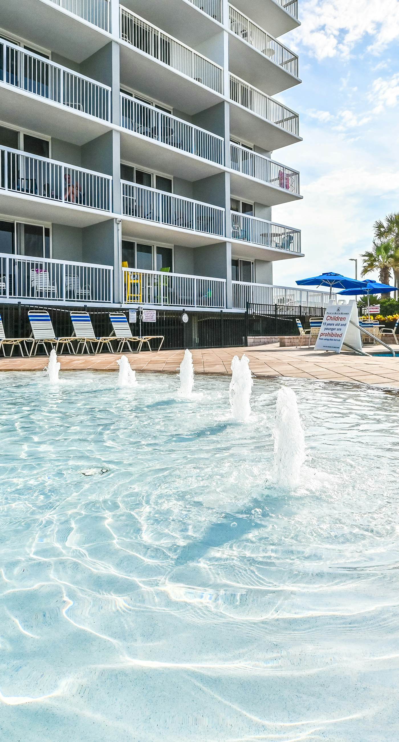 High-rise condo with ocean views, pool & balcony