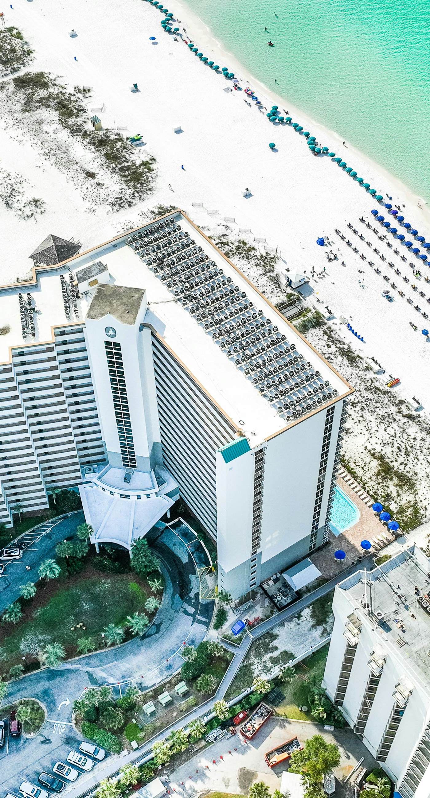 High-rise condo with ocean views, pool & balcony