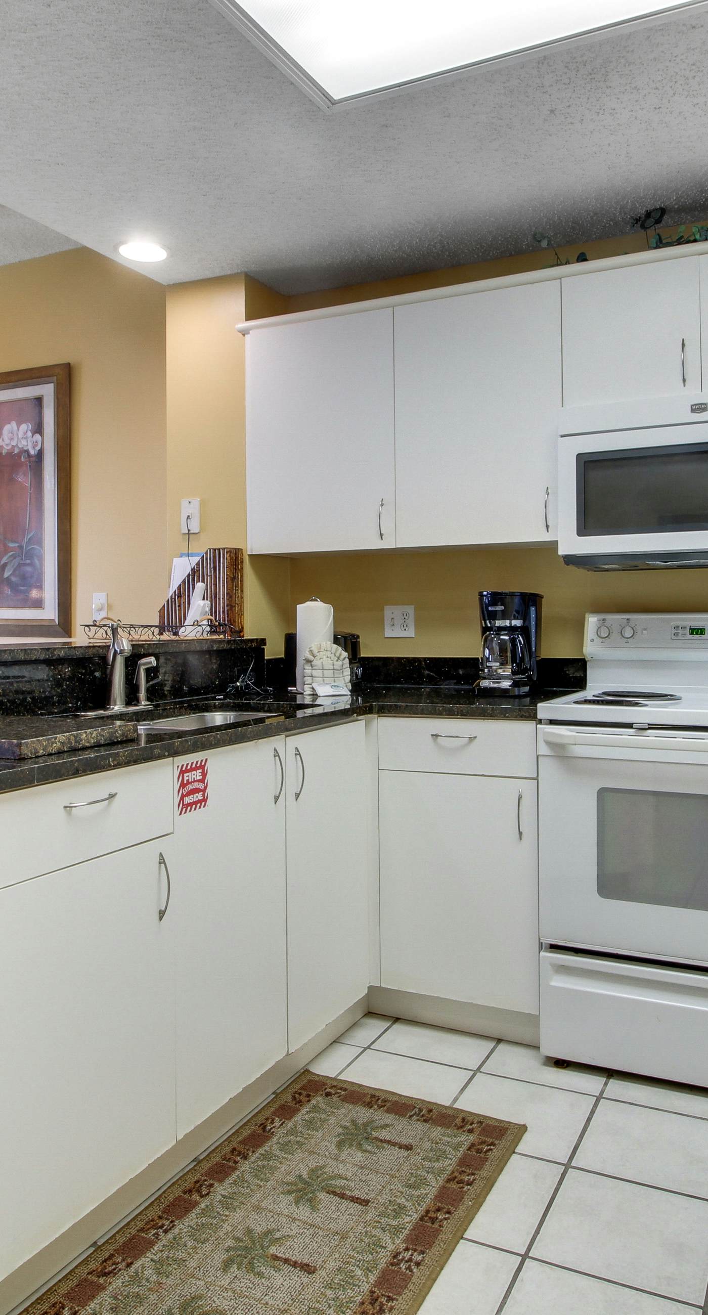 Amazing Gulf view from this cozy condo with pool, gym & beach access