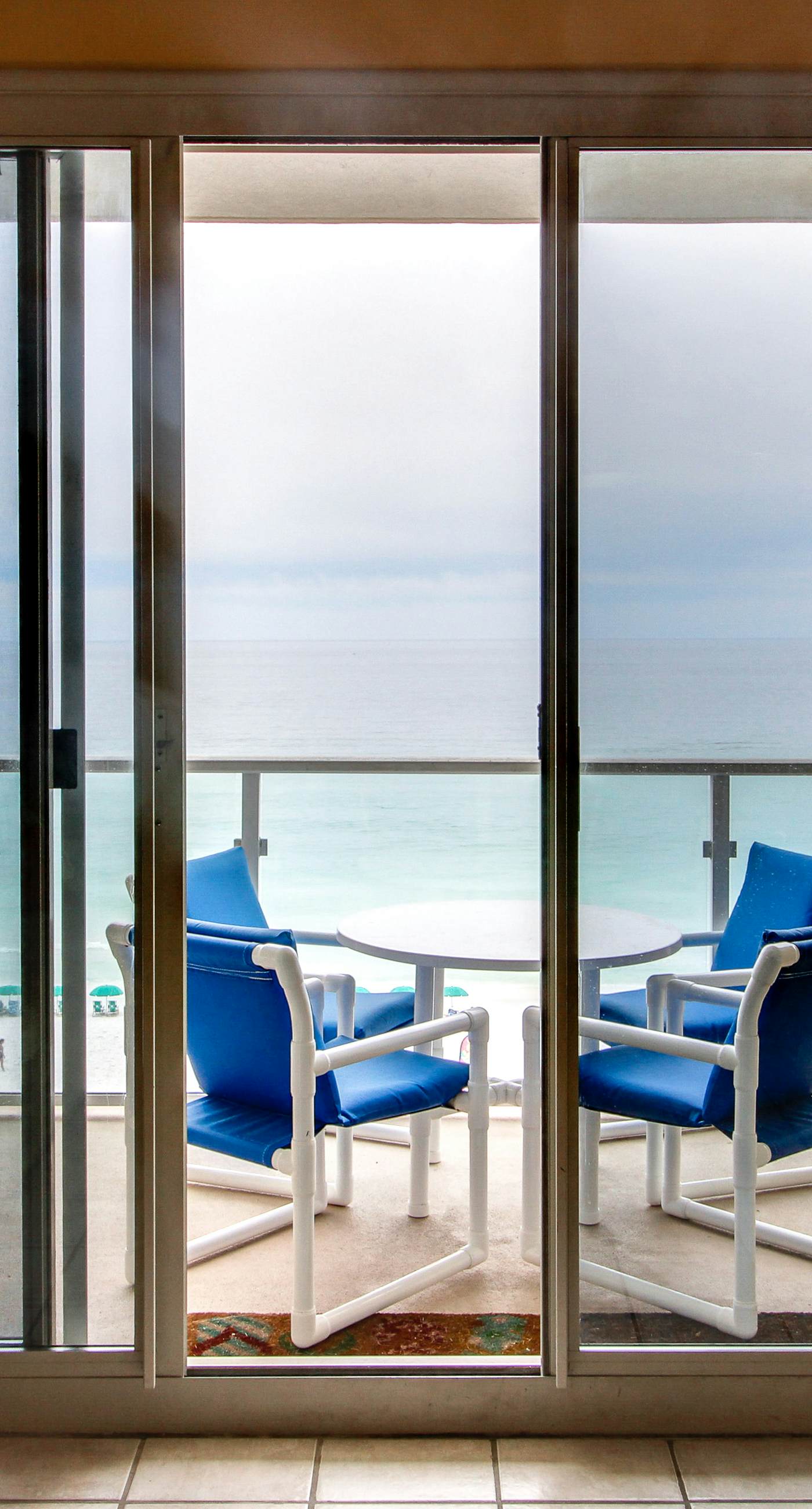 Amazing Gulf view from this cozy condo with pool, gym & beach access