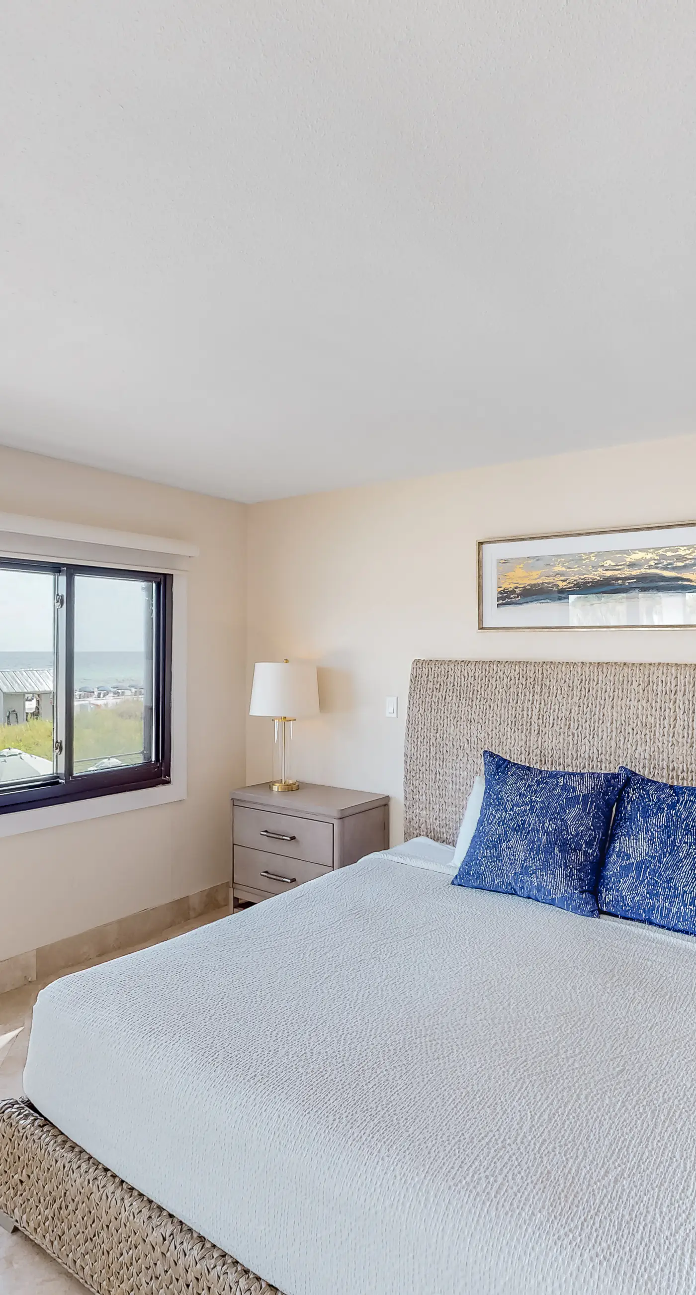 Second floor Gulf front condo with ocean views, central AC, and access to pool